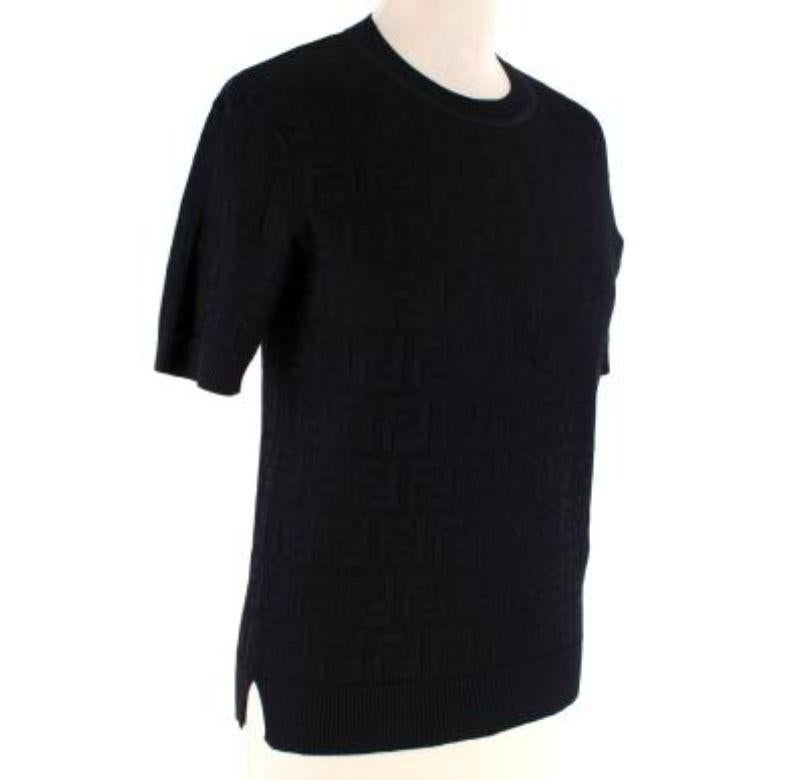 Fendi Black FF Stretch-Knit Top
 
 - Allover FF jacquard 
 - Ribbed crew neck, short sleeves and hemline 
 - Soft, lightweight cotton 
 - Slim fitting 
 
 Materials:
 56% Cotton
 44% Viscose 
 
 Made in Italy
 Hand wash only 
 
 9/10 very good