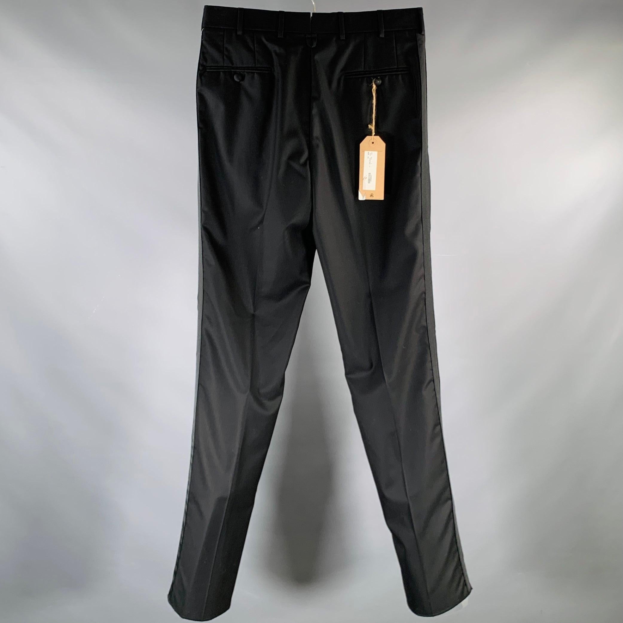 BLACK FLEECE by THOM BROWNE tuxedo dress pants
in a black wool fabric featuring a flat front style, side stripes, and button fly closure. Made in USA.New With Tags. 

Marked:   BB2 

Measurements: 
  Waist: 32 inches Rise: 10.5 inches Inseam: 37