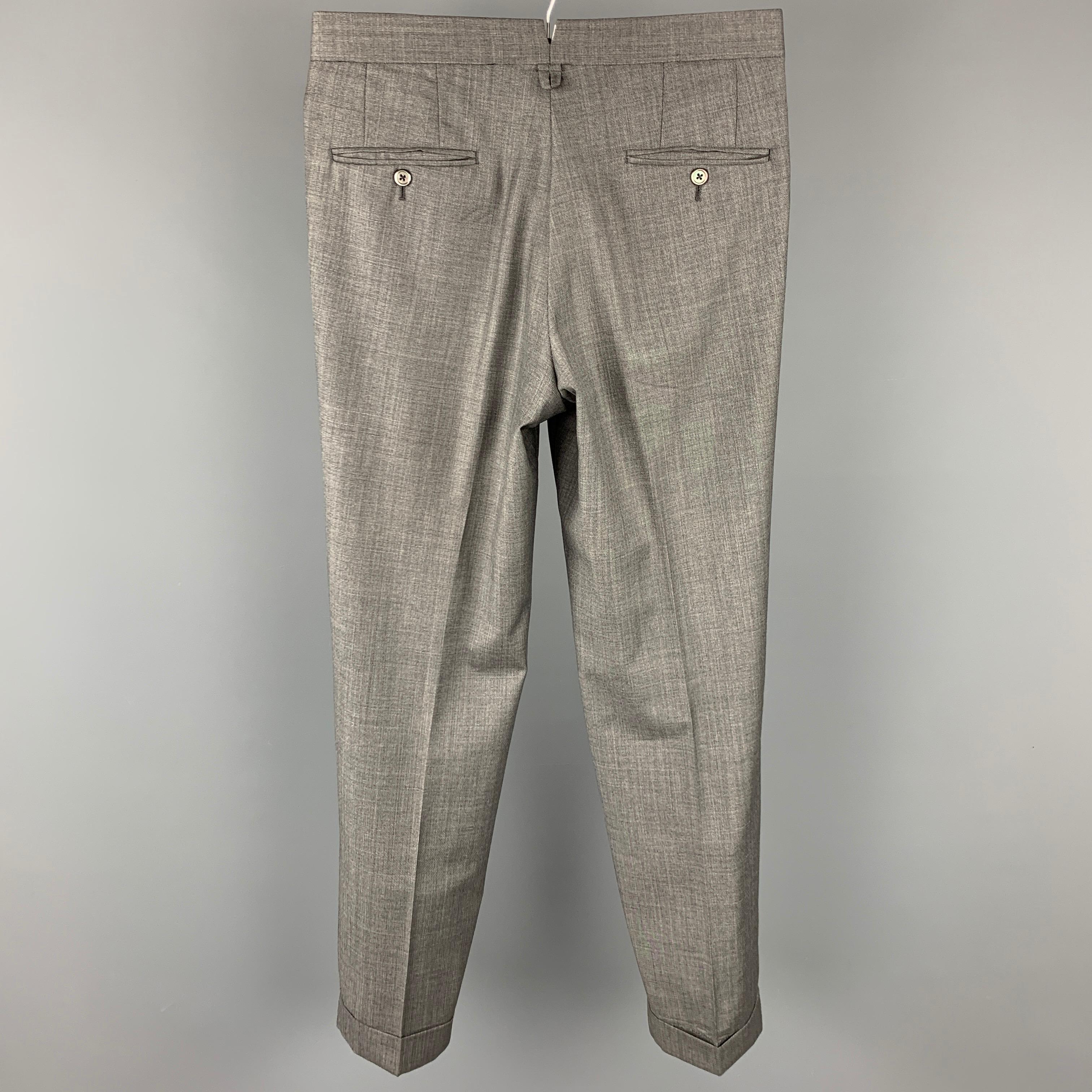BLACK FLEECE dress pants comes in a grey heather wool featuring a flat front, front tab, and a zip fly closure. Made in USA.

Very Good Pre-Owned Condition.
Marked: BB1

Measurements:

Waist: 32 in.
Rise: 11 in.
Inseam: 32 in. 