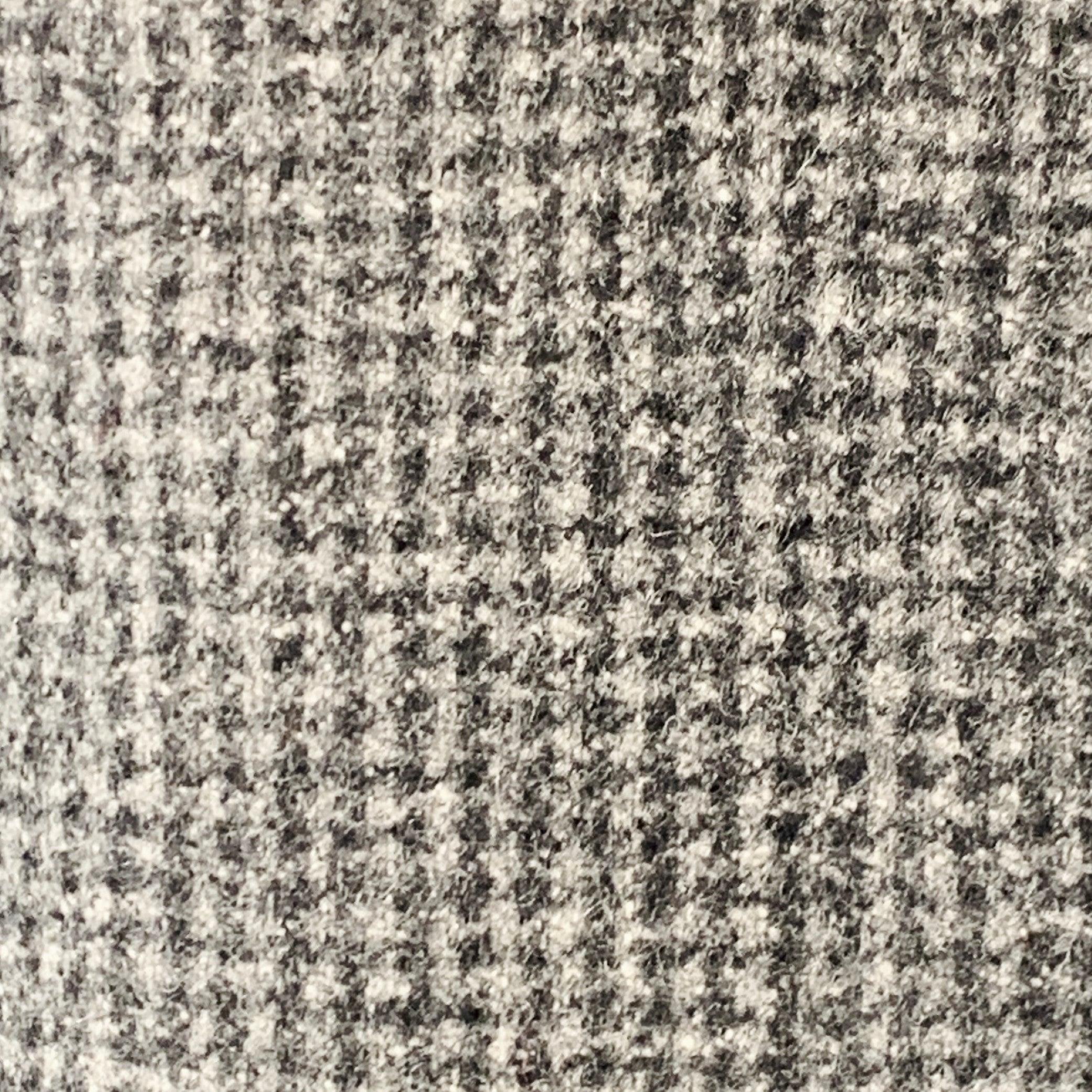 BLACK FLEECE sport coat
in a grey and charcoal grey wool featuring a grid pattern, notch lapel, single vented back, and three button closure. Made in USA.Very Good Pre-Owned Condition. Minor marks under arms and along inner pocket trim. 

Marked:  