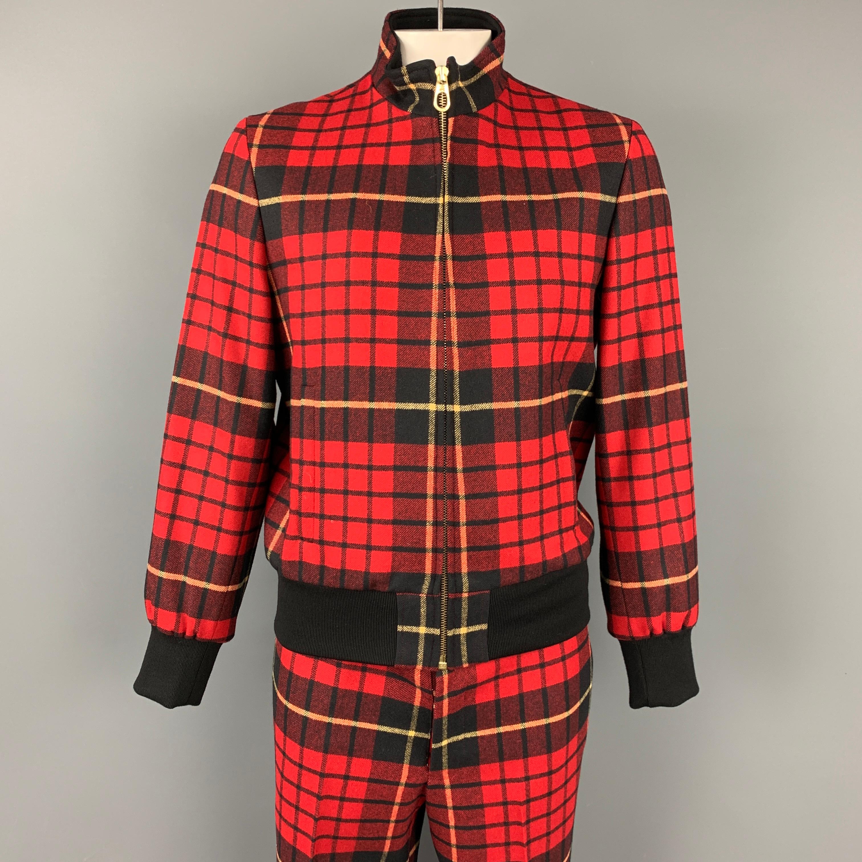 BLACK FLEECE set comes in a red & black plaid wool with a full liner featuring ribbed hem, zip up closure jacket. Also, includes matching flat front pants. Made in Romania.

New With Tags.
Marked: BB4

Measurements:

-Jacket
Shoulder: 18.5