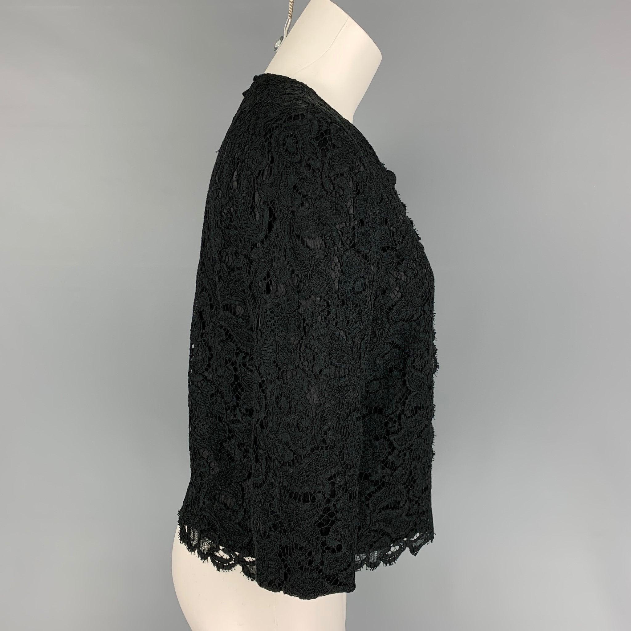 BLACK FLEECE jacket comes in a black lace cotton blend featuring a cropped style and a buttoned closure.
Very Good
Pre-Owned Condition. 

Marked:   BB2 

Measurements: 
 
Shoulder: 15 inches  Bust: 34 inches  Sleeve: 16.5 inches  Length: 20 inches 

