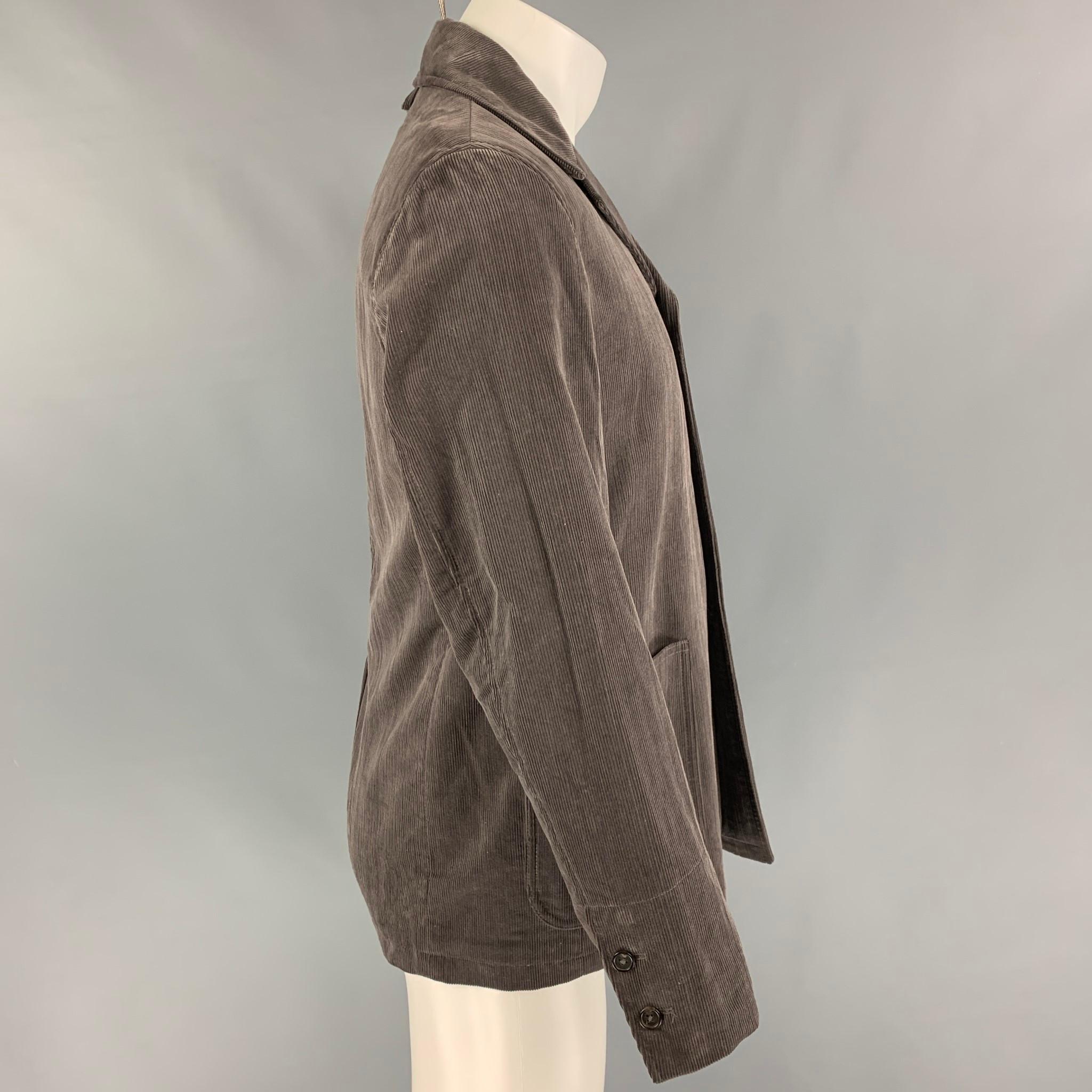 BLACK FLEECE jacket comes in a gray corduroy featuring patch pockets, spread collar, single back vent, and a buttoned closure. 

New With Tags.
Marked: BB2

Measurements:

Shoulder: 17 in.
Chest: 41 in.
Sleeve: 25 in.
Length: 28.5 in. 
