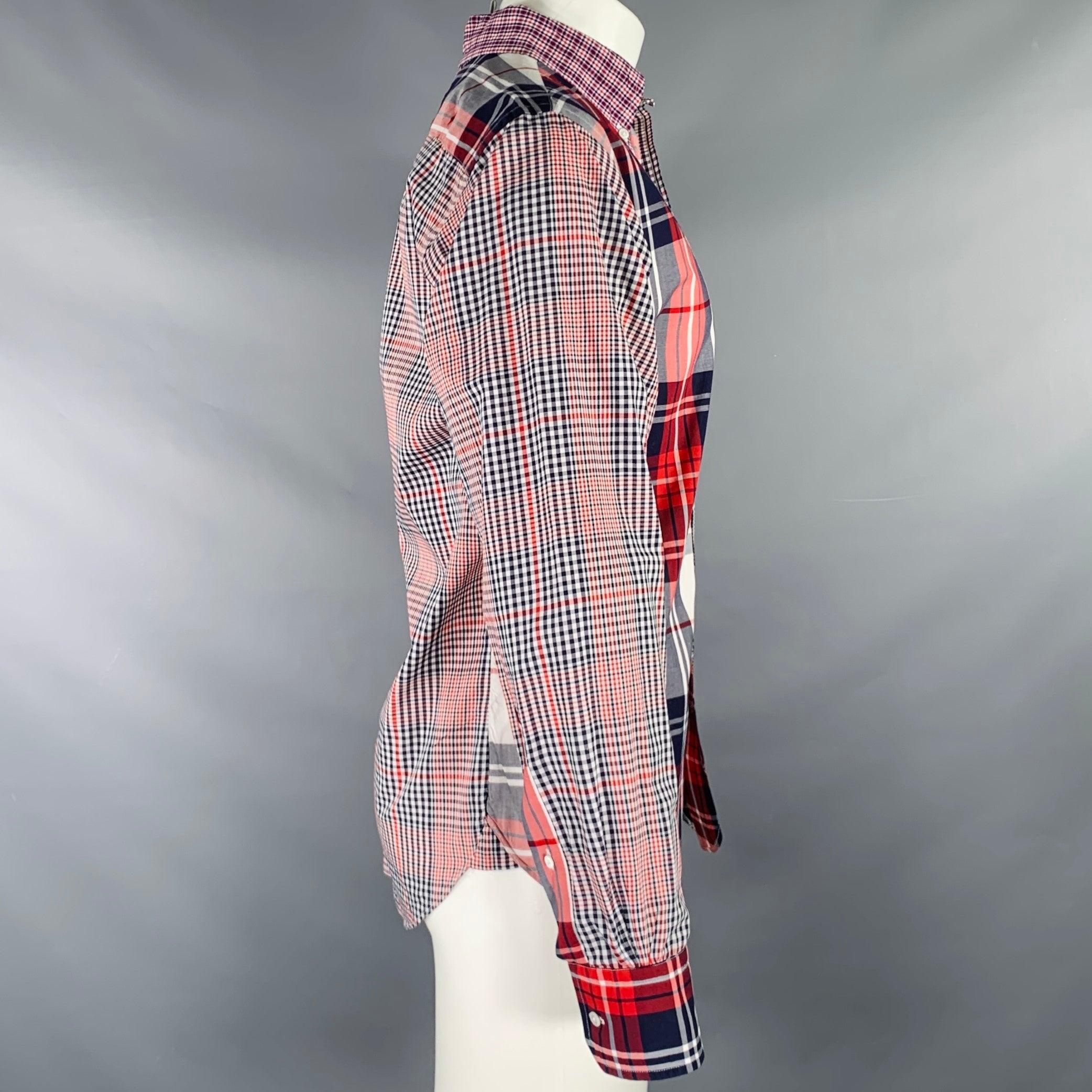 BLACK FLEECE long sleeve shirt
in
a red, white, & blue cotton woven fabric featuring a mixed plaid pattern design, one pocket, and button closure. Made in USA.Very Good Pre-Owned Condition. Minor signs of wear. 

Marked:   BB3 

Measurements: 
