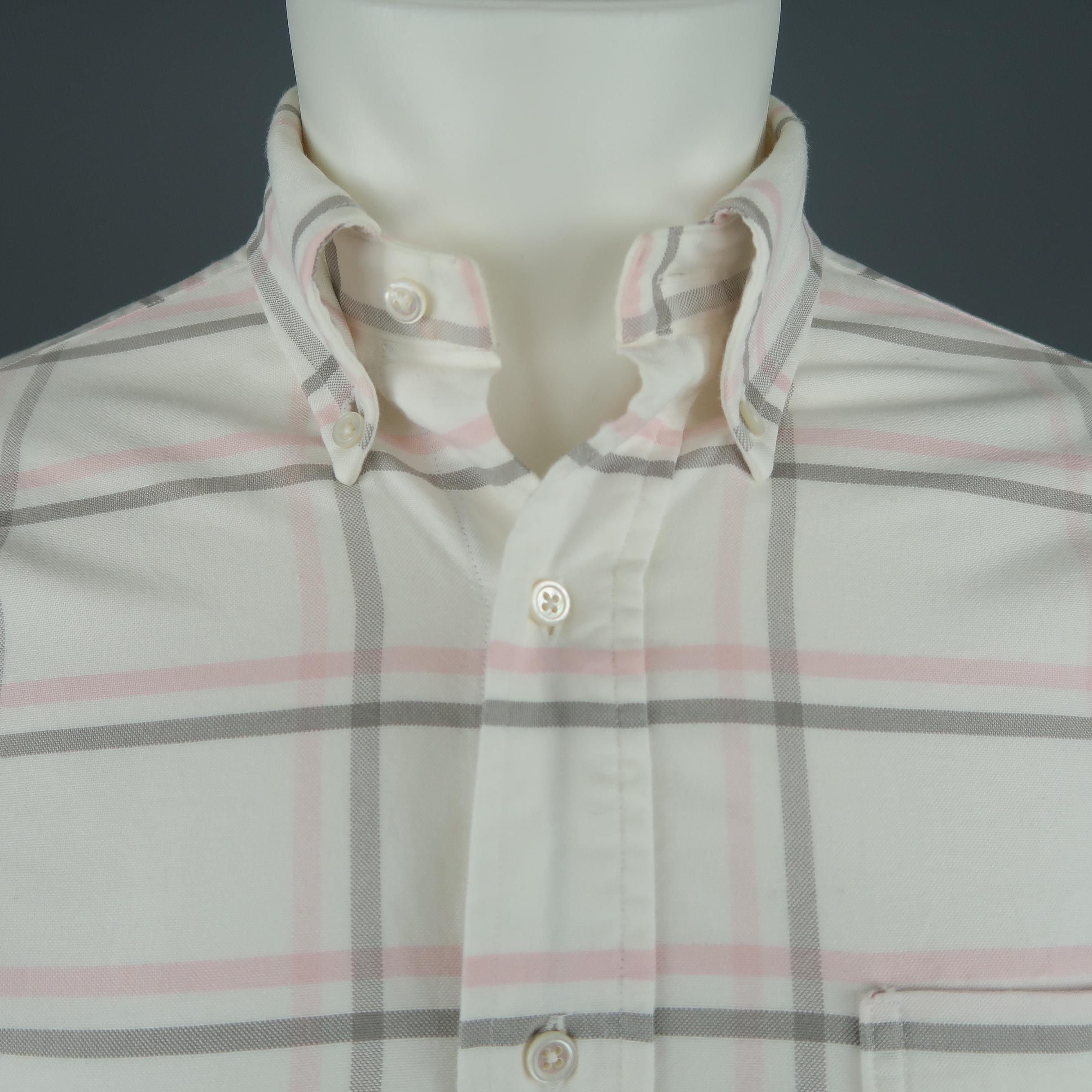 BLACK FLEECE shirt comes in off white cotton with brown and pink plaid pattern throughout, button down collar, curved hem, and patch pocket. Made in USA. Retail price $225,00. 
 
Excellent Pre-Owned Condition.
Marked: BB0
 
Measurements:
 
Shoulder: