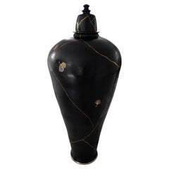 black floor vase with kintsugi and gingko
