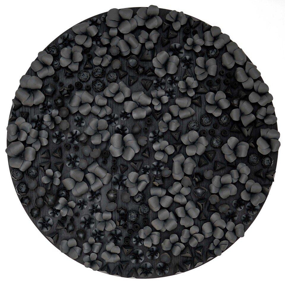 Black Flora Wall Sculpture by Valeria Nascimento
Dimensions: D 100 x H 10 cm.
Materials: Black stained porcelain assembled onto a charred oak. 

Statement
Over the years, their work has come to focus on large commission-based installations. They