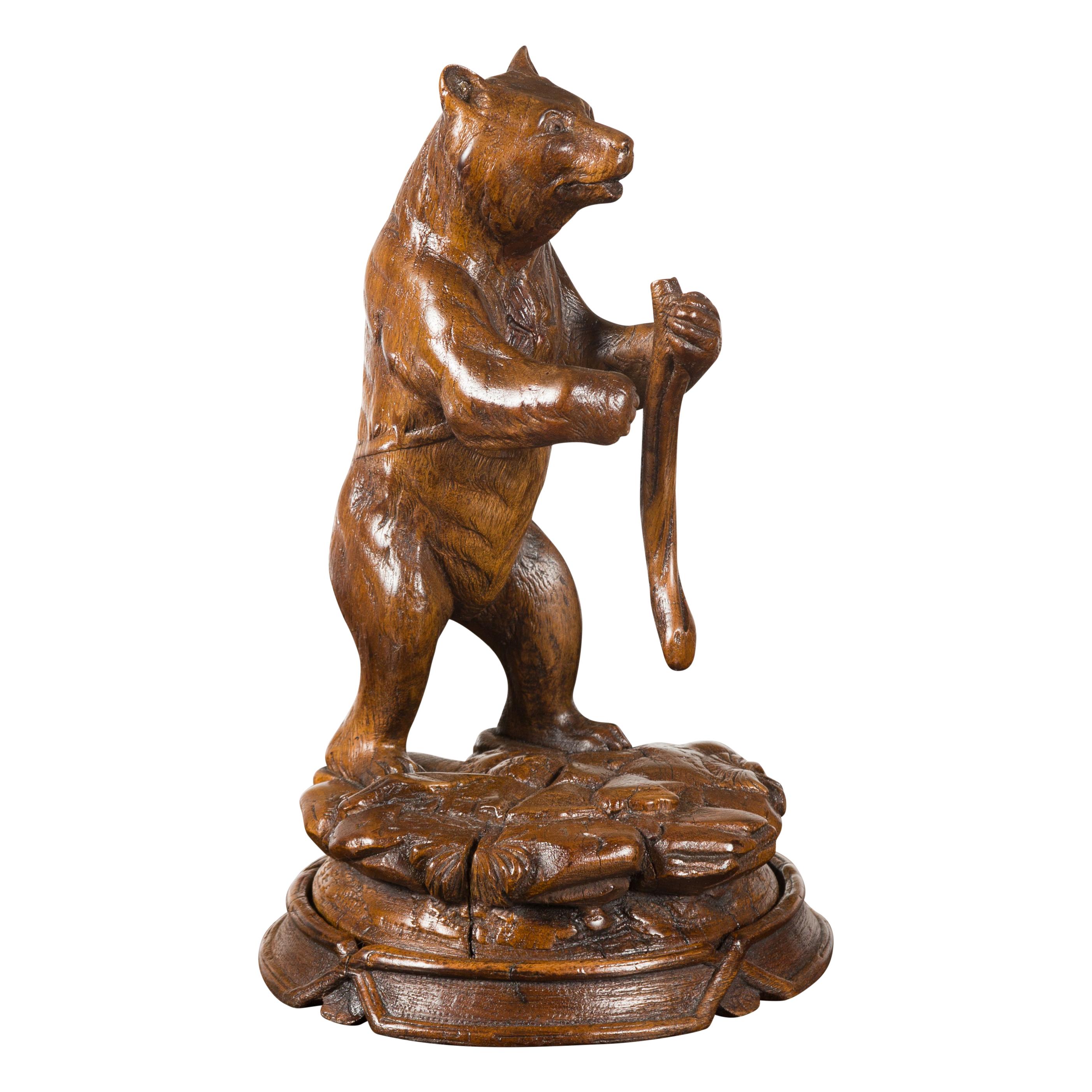 Black Forest 1890s Carved Wooden Bear Standing on a Circular Base For Sale