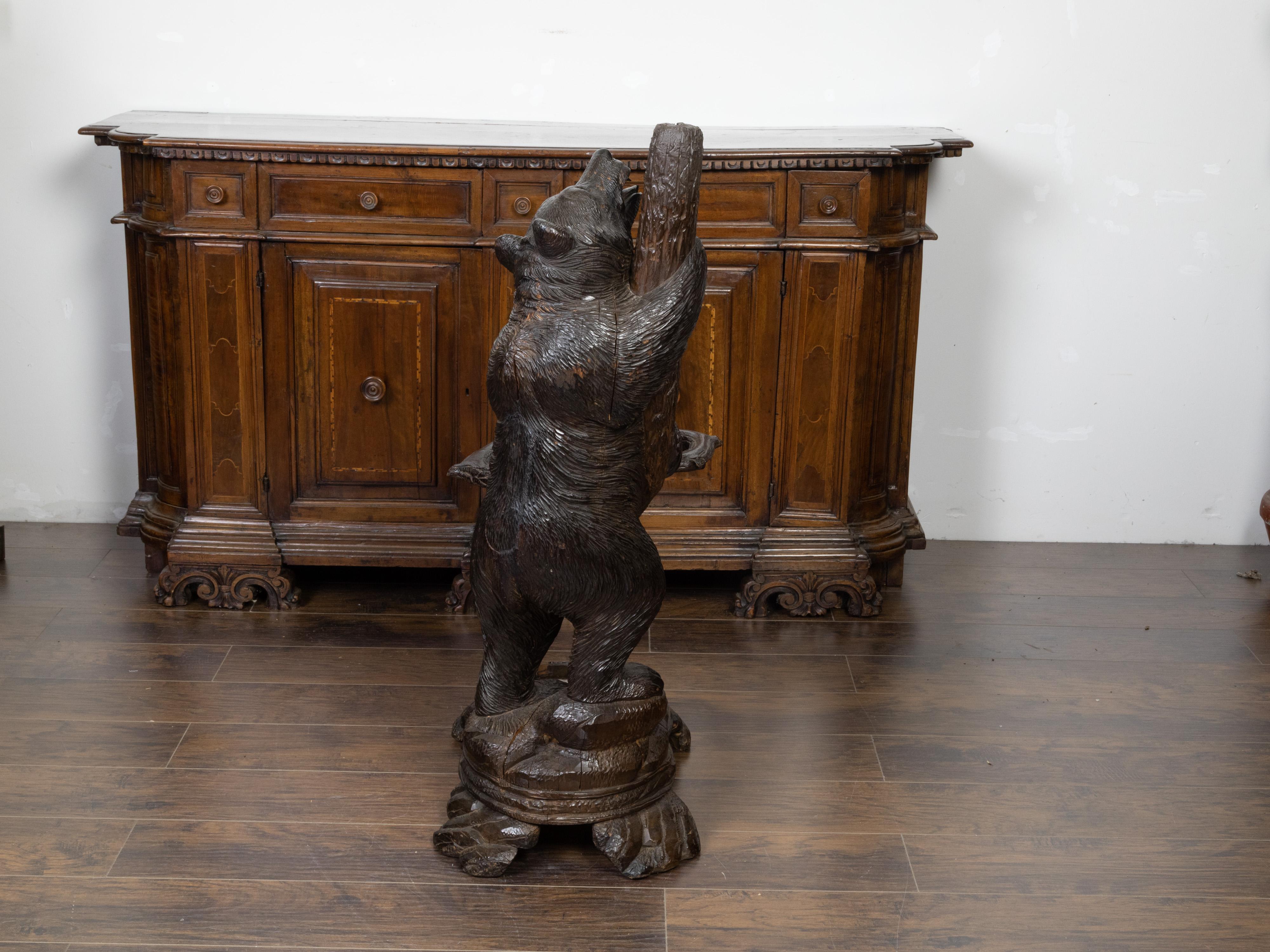 Hand-Carved Black Forest 1890s Carved Wooden Umbrella Stand Depicting a Bear Climbing a Tree For Sale