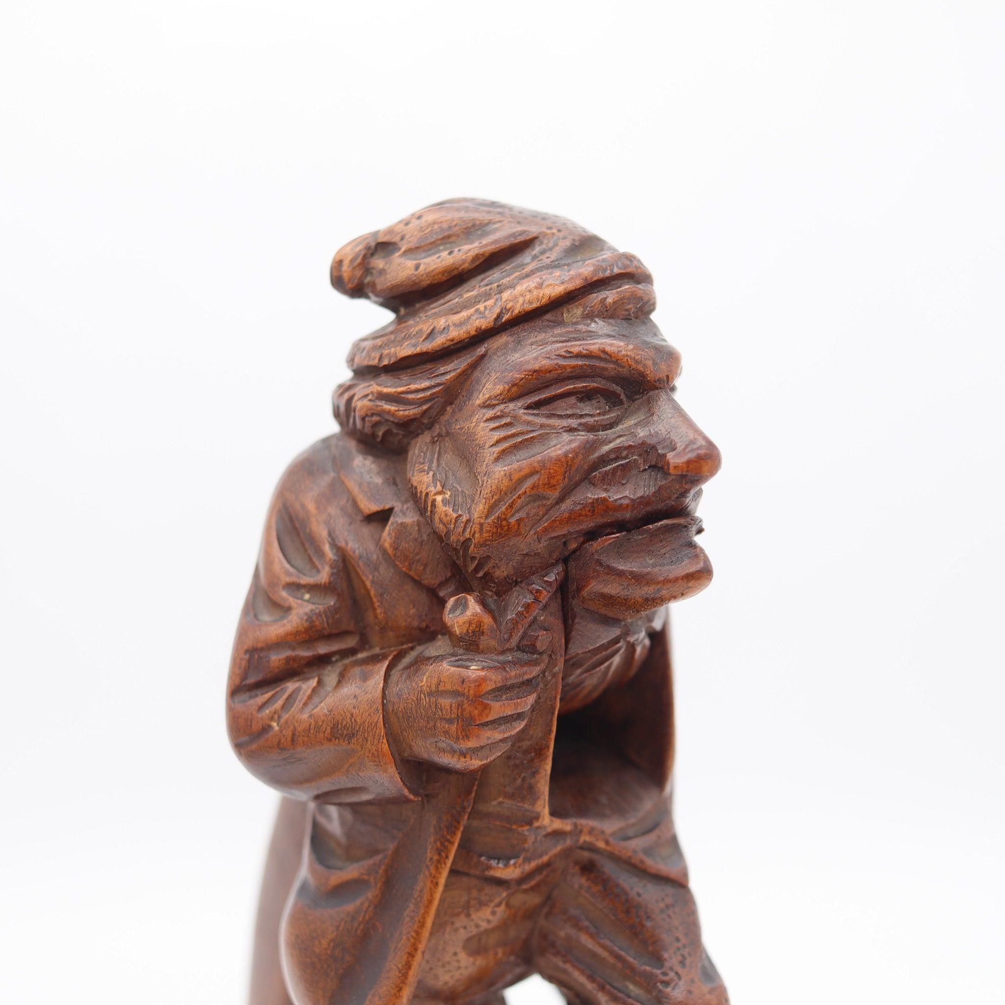A folk-art nutcracker carved in oak wood.

This is an elusive antique black forest nutcracker created in northern Europe, most probably in Germany or Switzerland back in the late 19th century, circa 1900. The folk-art nutcracker has been carefully