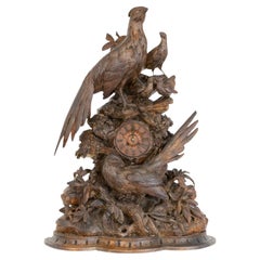 Black Forest 19ème siècle Horloge de manteau grand oiseau sculpté à la main