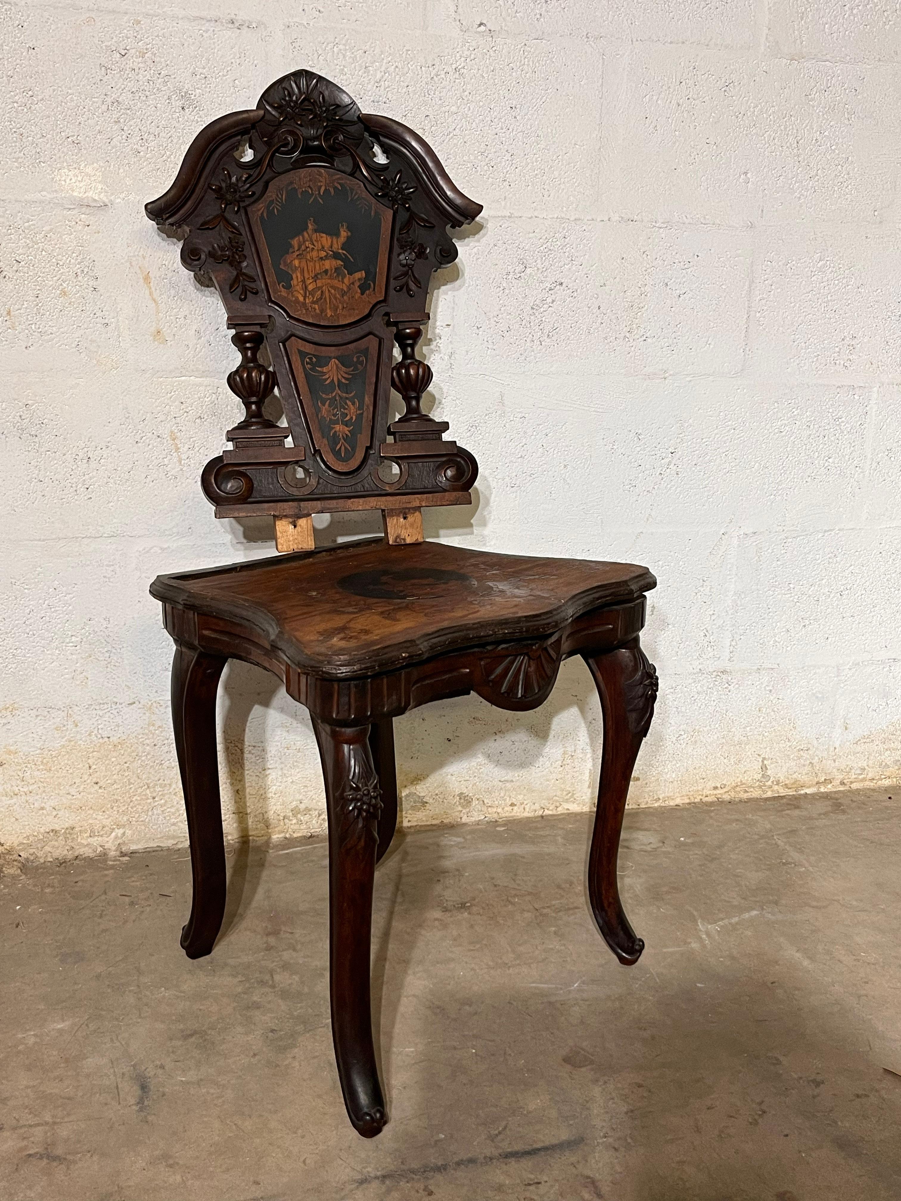 In walnut, the chairs are delicately carved with interesting inlayed of animal figures.
Sold as is to refinish.