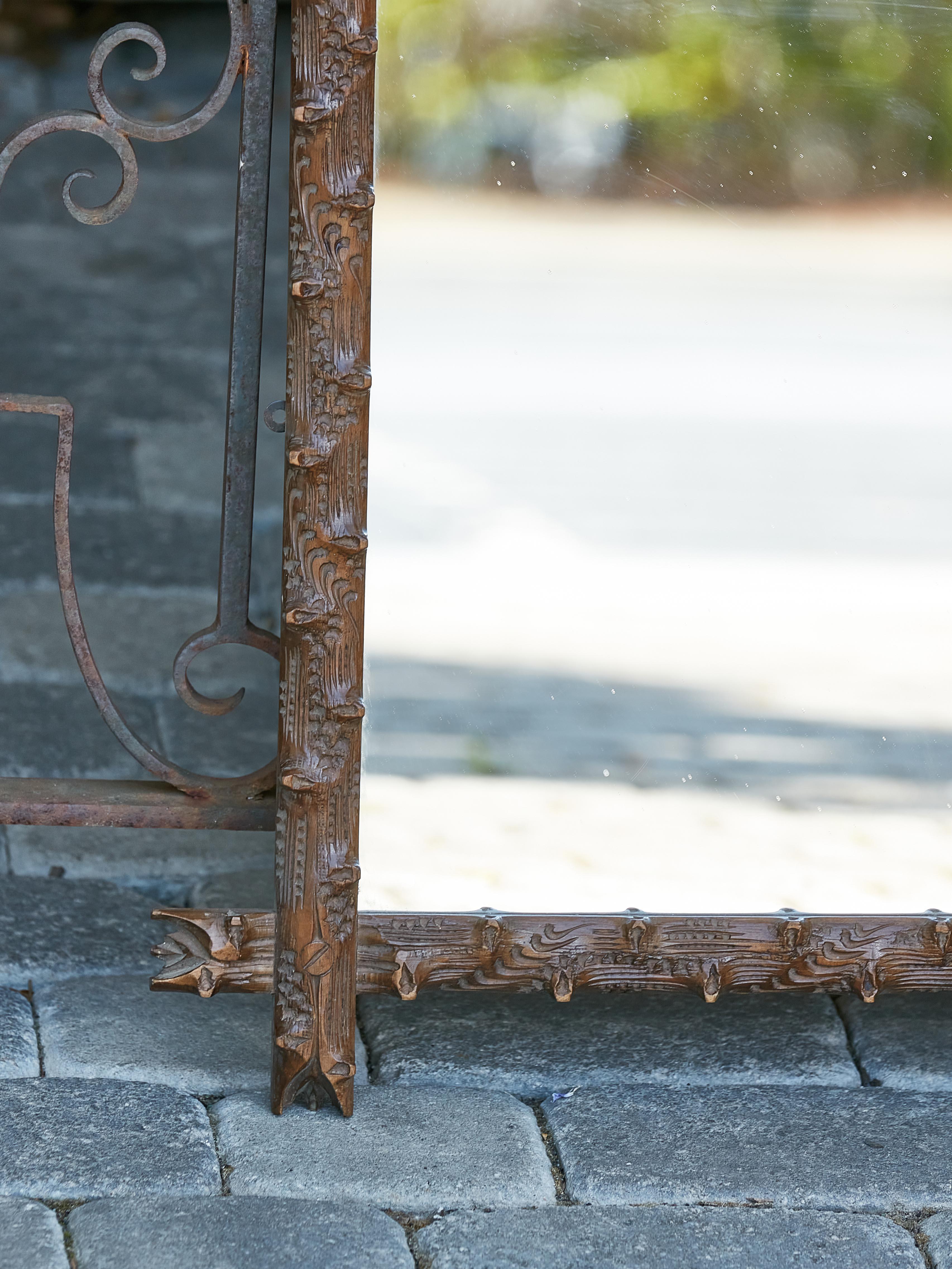 Black Forest 19th Century Wooden Mirror with Hand-Carved Wooden Frame In Good Condition For Sale In Atlanta, GA