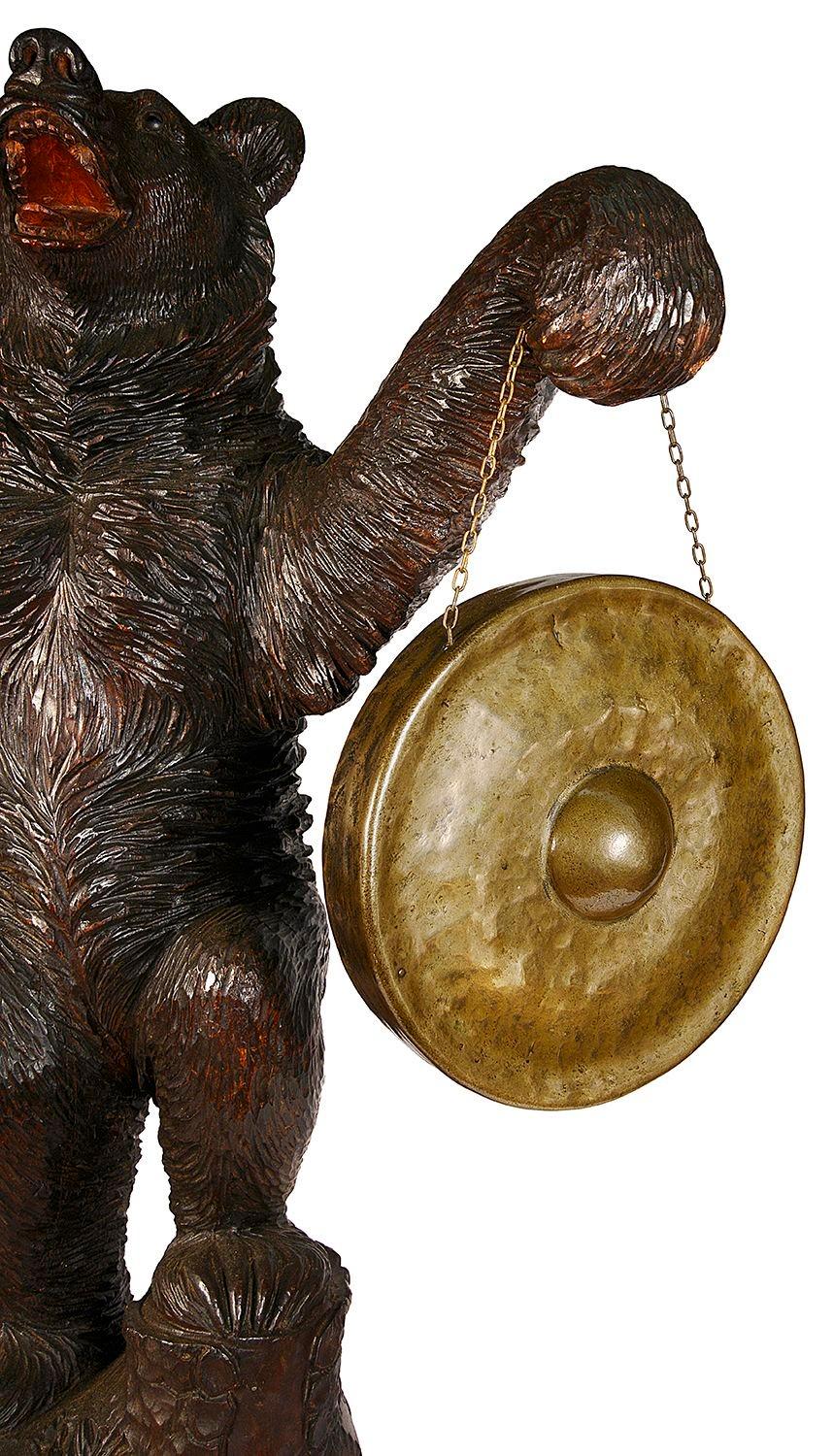 Swiss Black Forest Bear holding a Gong, 19th Century. For Sale