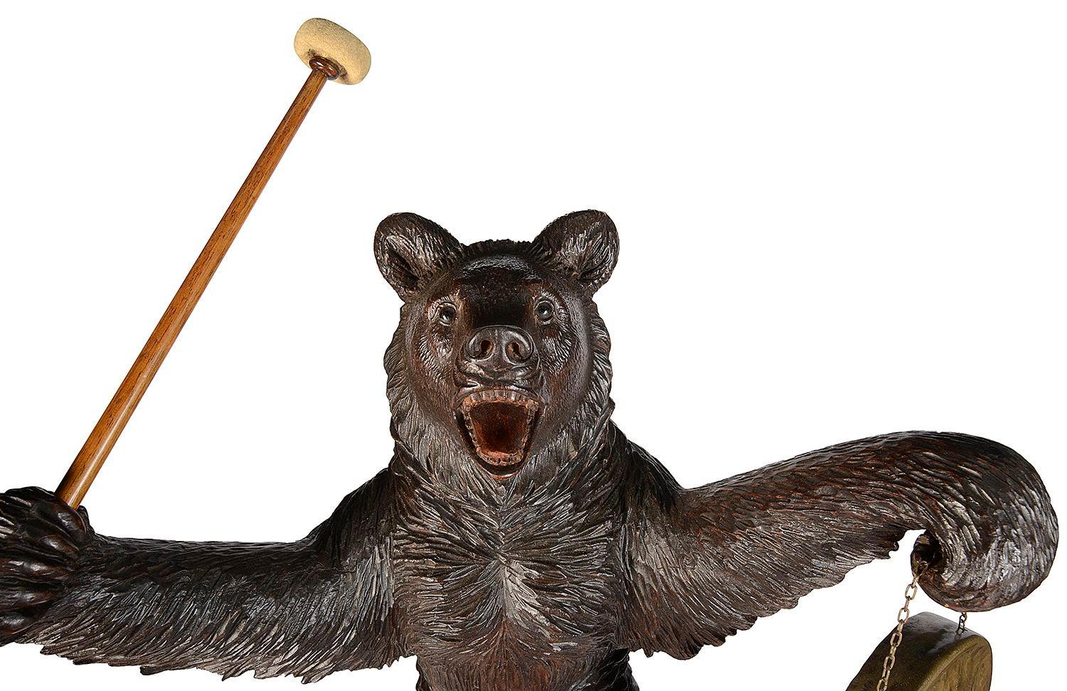 Hand-Carved Black Forest Bear holding a Gong, 19th Century. For Sale