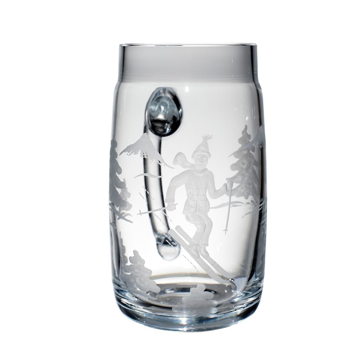 Beer glass called Bierseidl in clear crystal glass. Hand blown in Bavaria and hand-engraved with trees and a skier boy in the style of Black Forest. For 0.7 liter beer. Can be ordered per one or as a set with six.