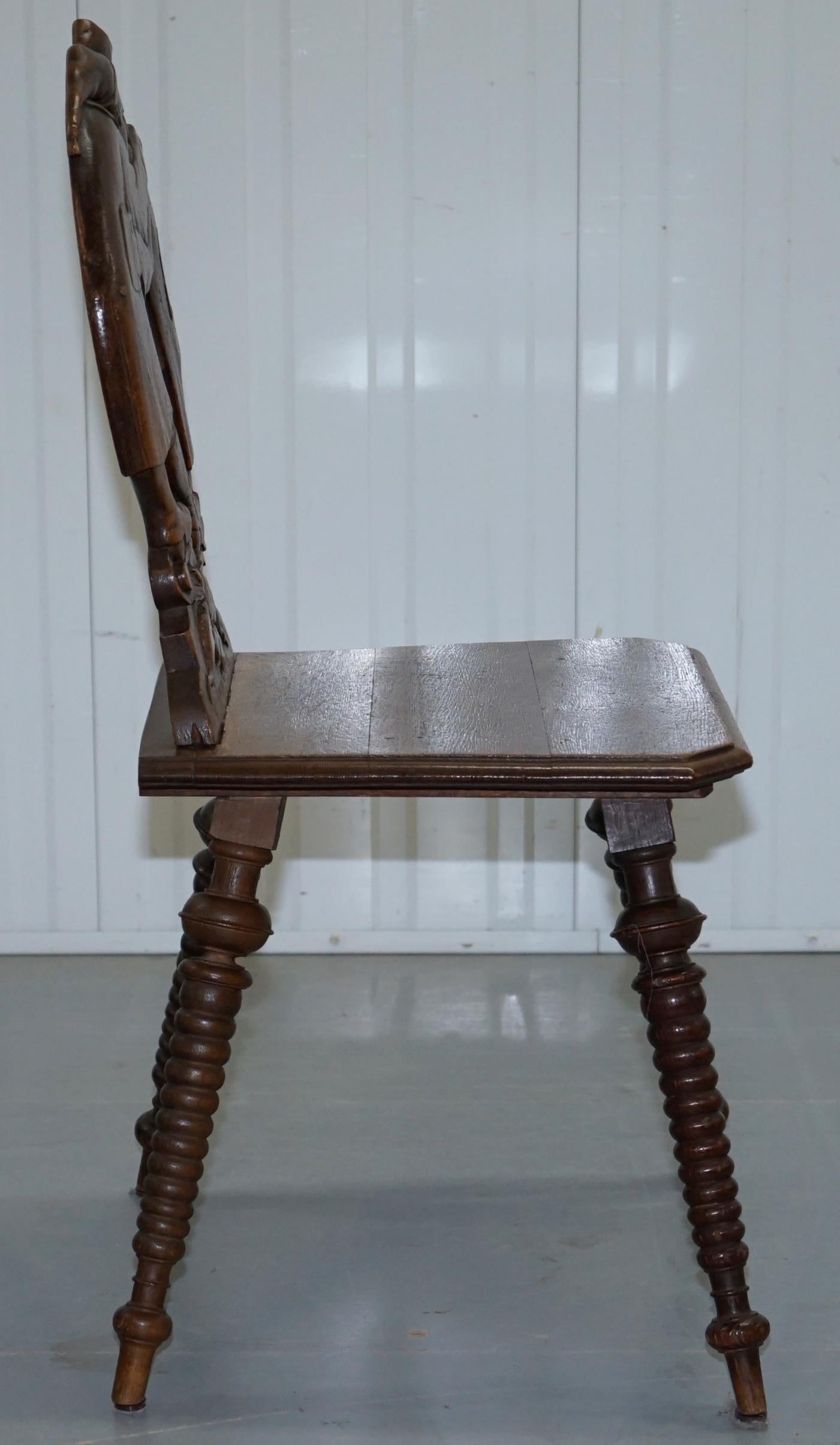 Black Forest Carve Oak Bobbin Hall Chair Depicting Two Friends Hugging Scrooge For Sale 3