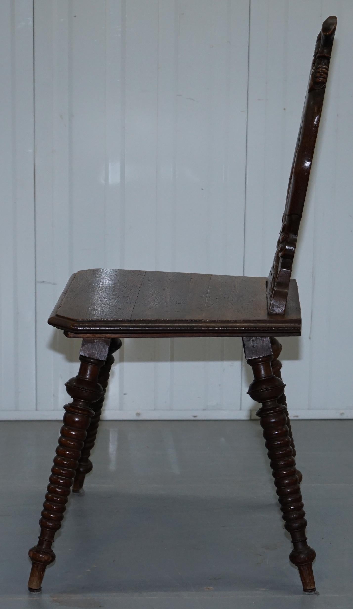 Black Forest Carve Oak Bobbin Hall Chair Depicting Two Friends Hugging Scrooge For Sale 9