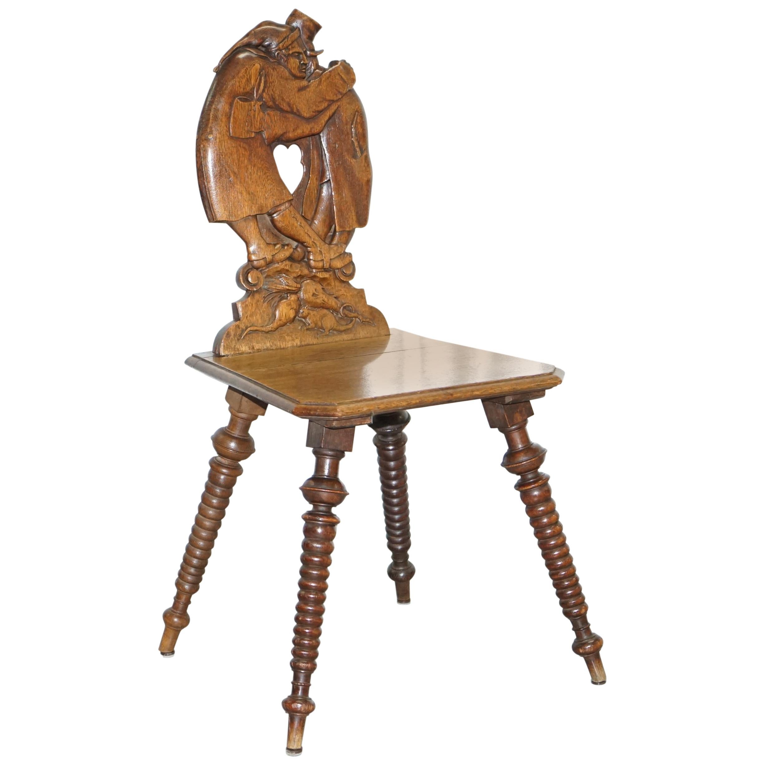 Black Forest Carve Oak Bobbin Hall Chair Depicting Two Friends Hugging Scrooge For Sale
