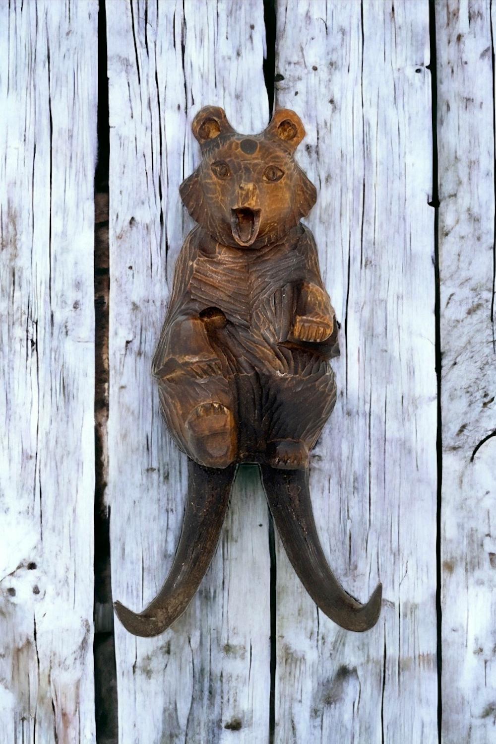 Classic 1890s black forest Brienz wood carved Bear as a Whip Holder or Wall Hook. Nice addition to your room or just for use it on your wall. Made of hand carved wood. Found at an estate sale in Vienna, Austria. Love this Black Forest Bear, very