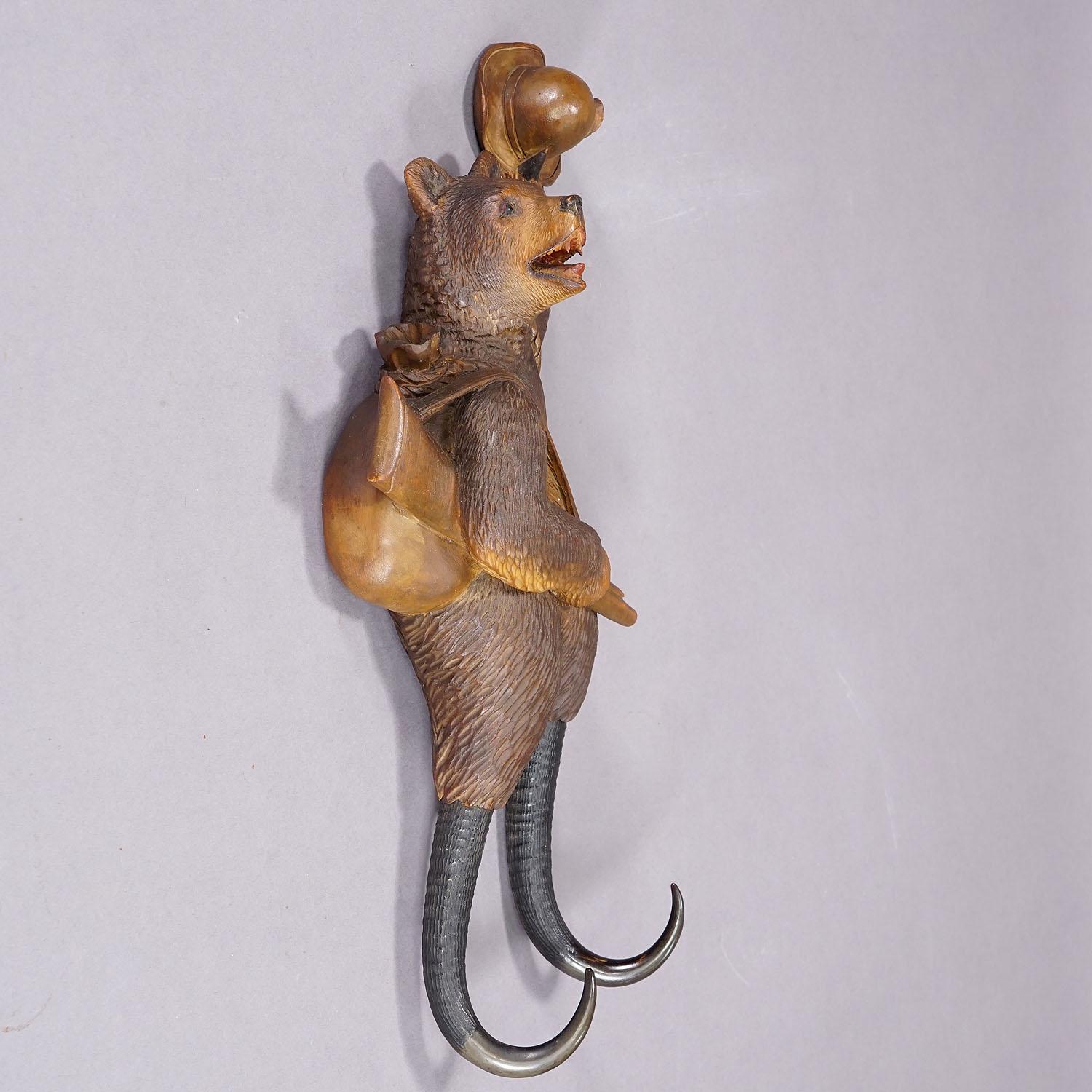 20th Century Black Forest Carved Coat Hook with Bear Poacher ca. 1900s