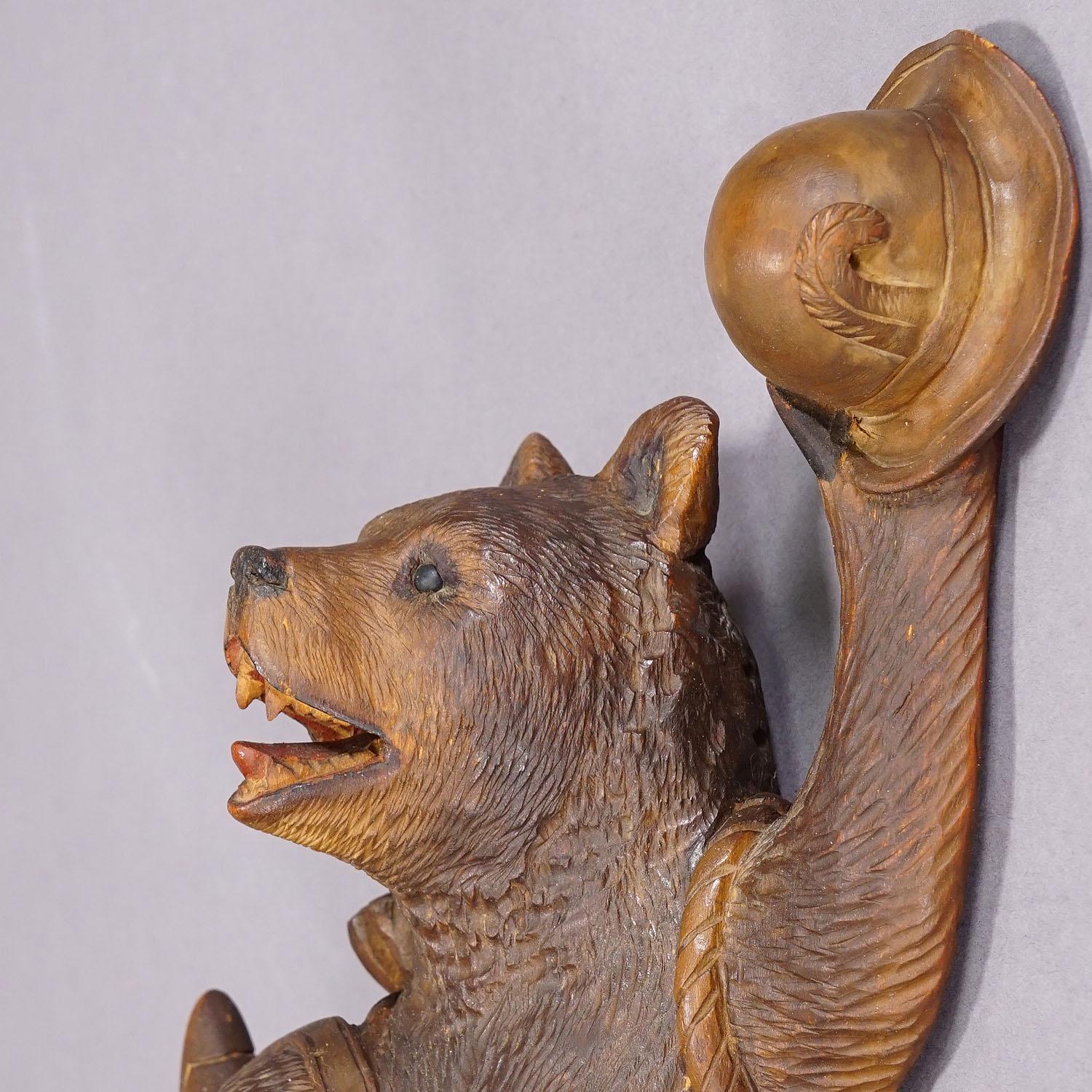 Black Forest Carved Coat Hook with Bear Poacher ca. 1900s 1