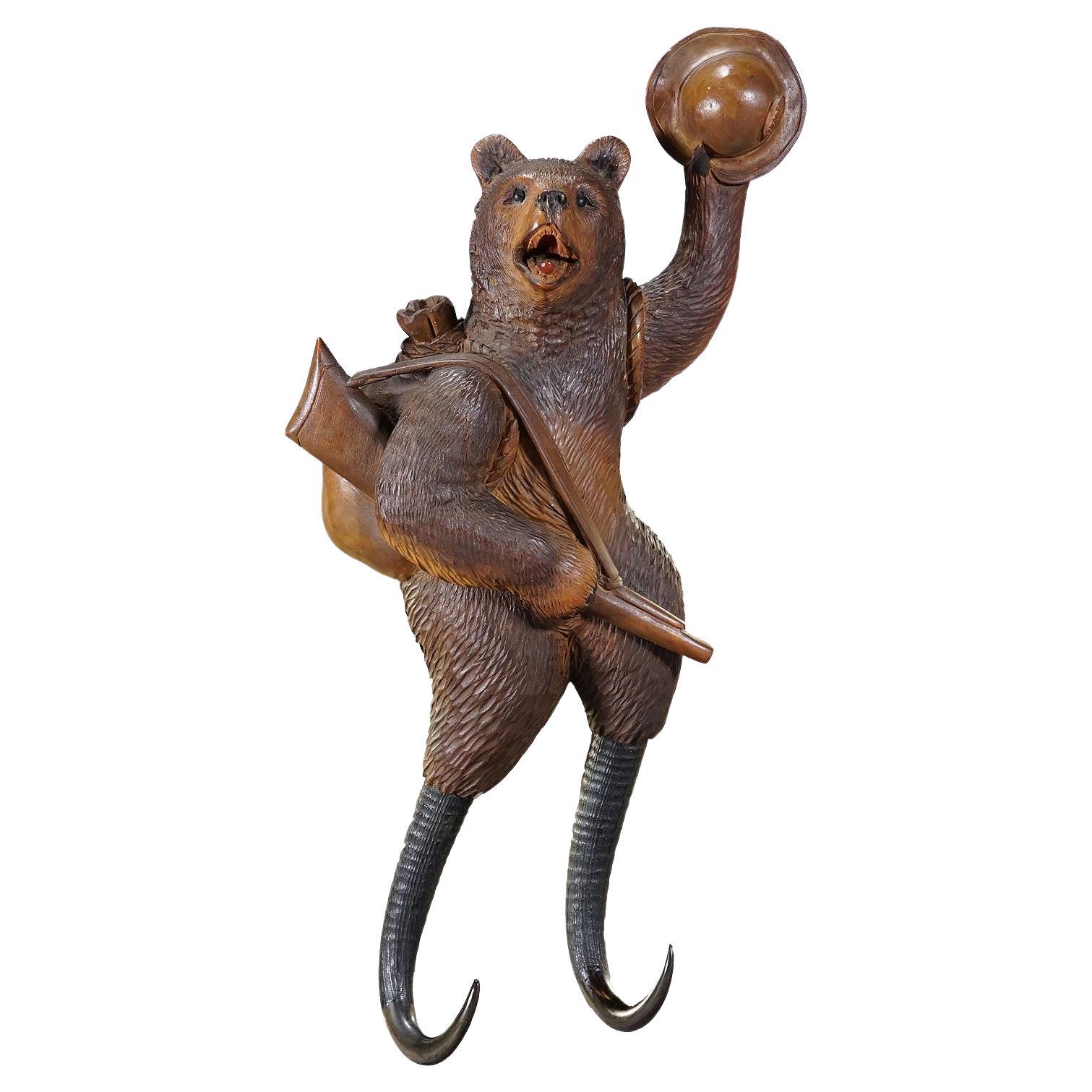 Black Forest Carved Coat Hook with Bear Poacher ca. 1900s