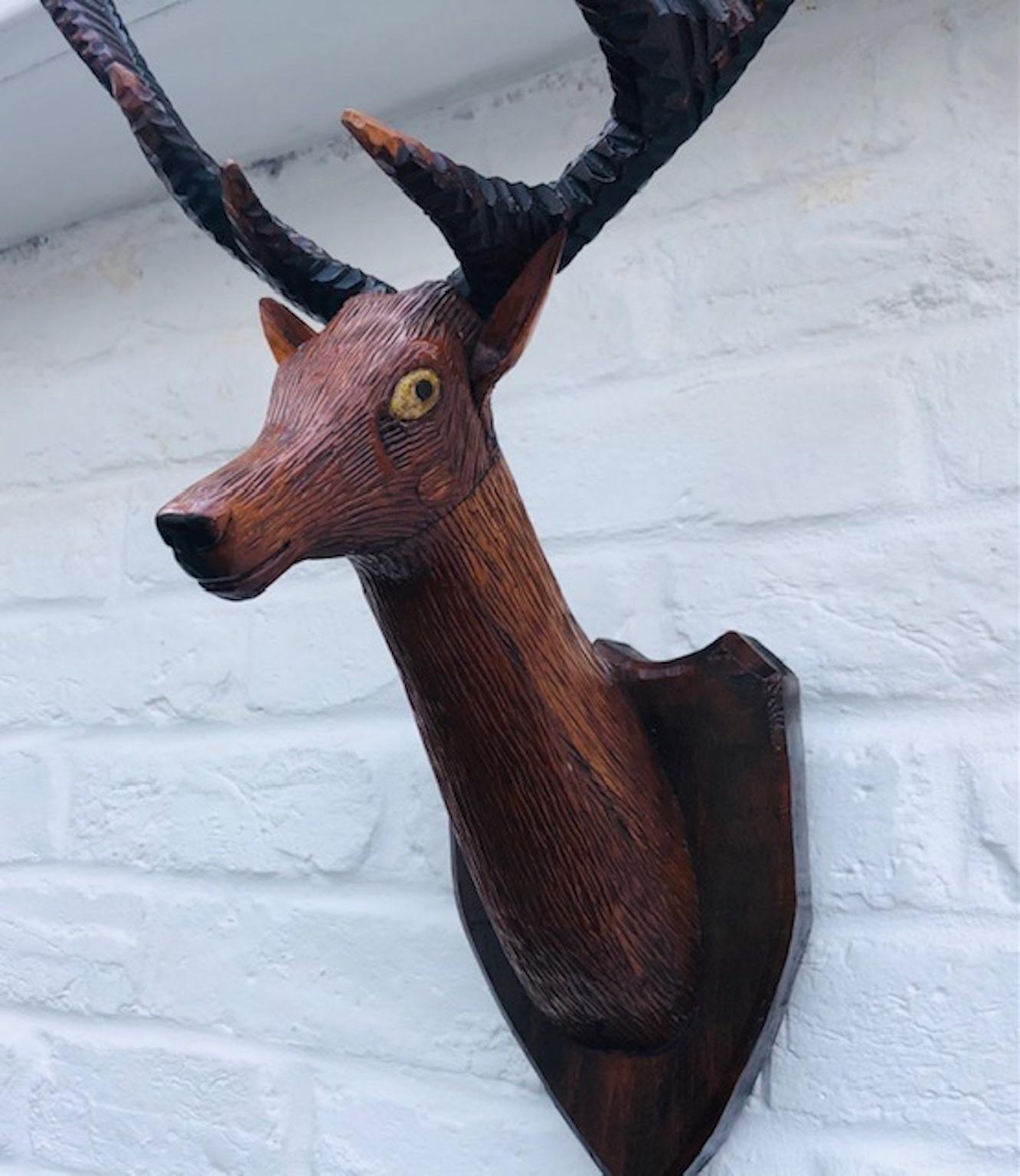 Hand-Carved Black Forest Carved Deer or Stag Head and Antlers on Plaque, Germany, 1900 For Sale