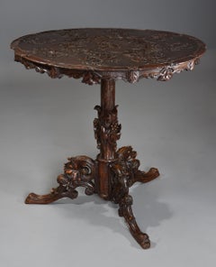 Black Forest Carved Linden Wood Centre Table with Tri-Form Base