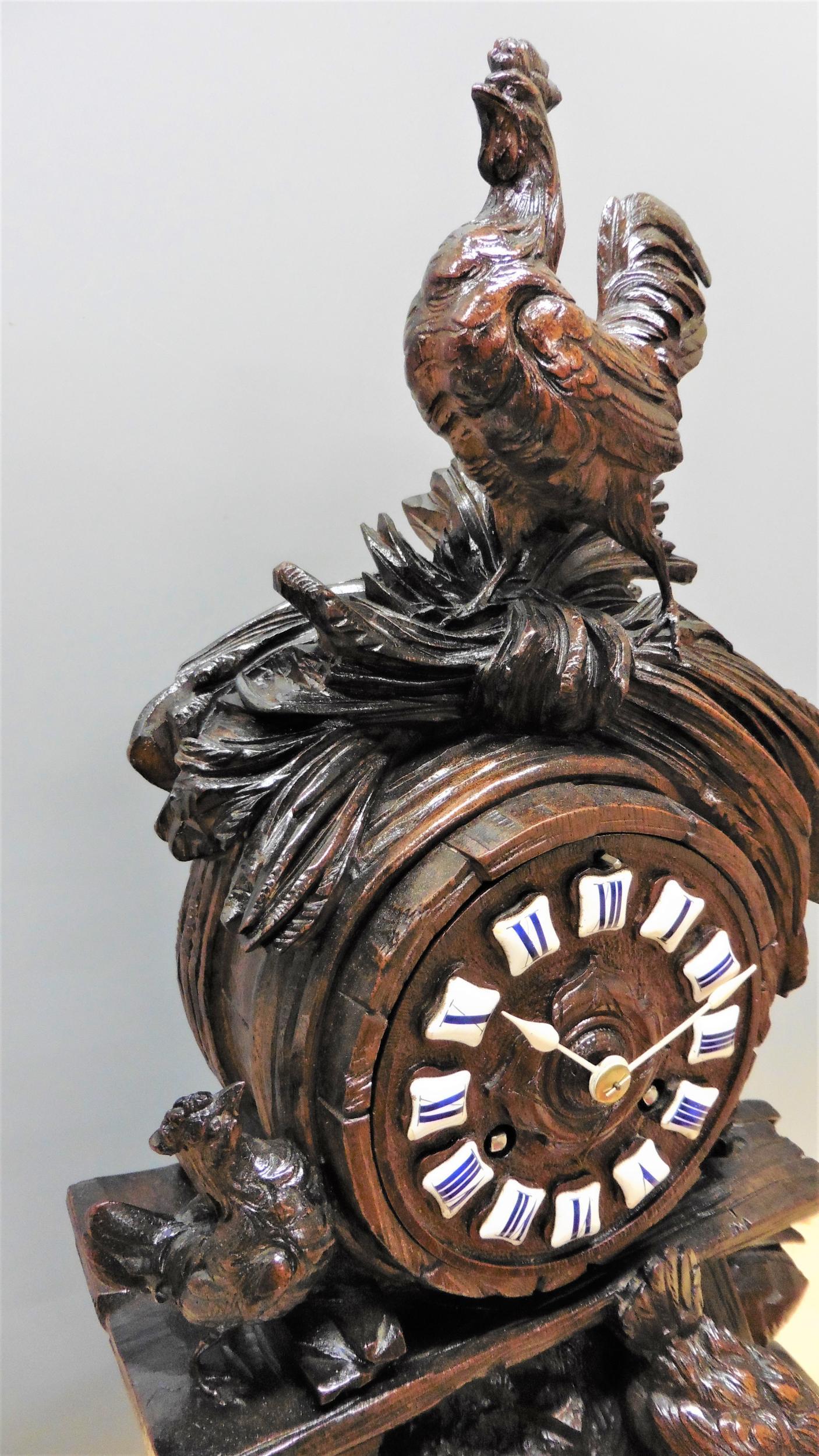 German Black Forest Carved Mantel Clock For Sale