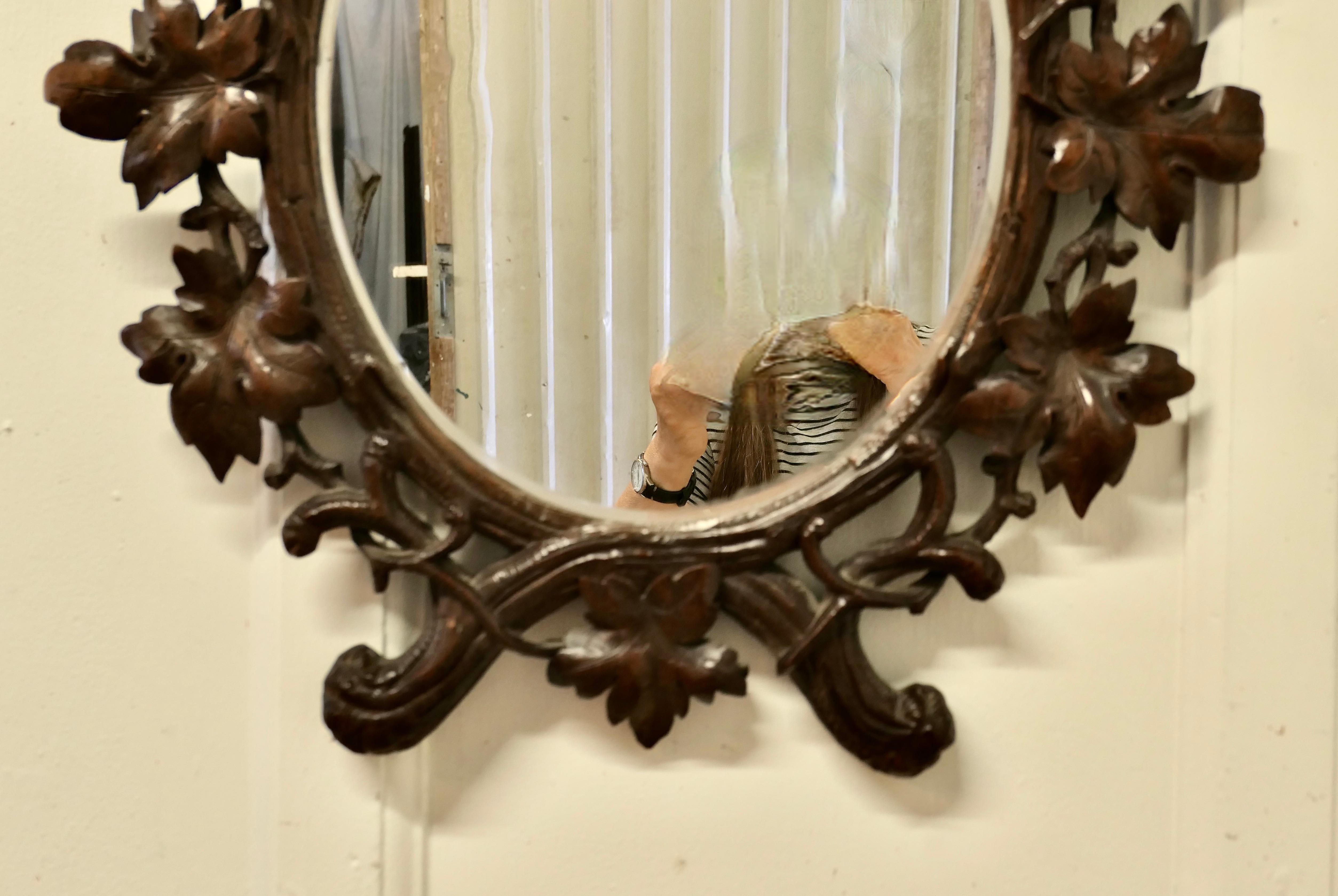 Black Forest Carved Oval Mirror For Sale 1