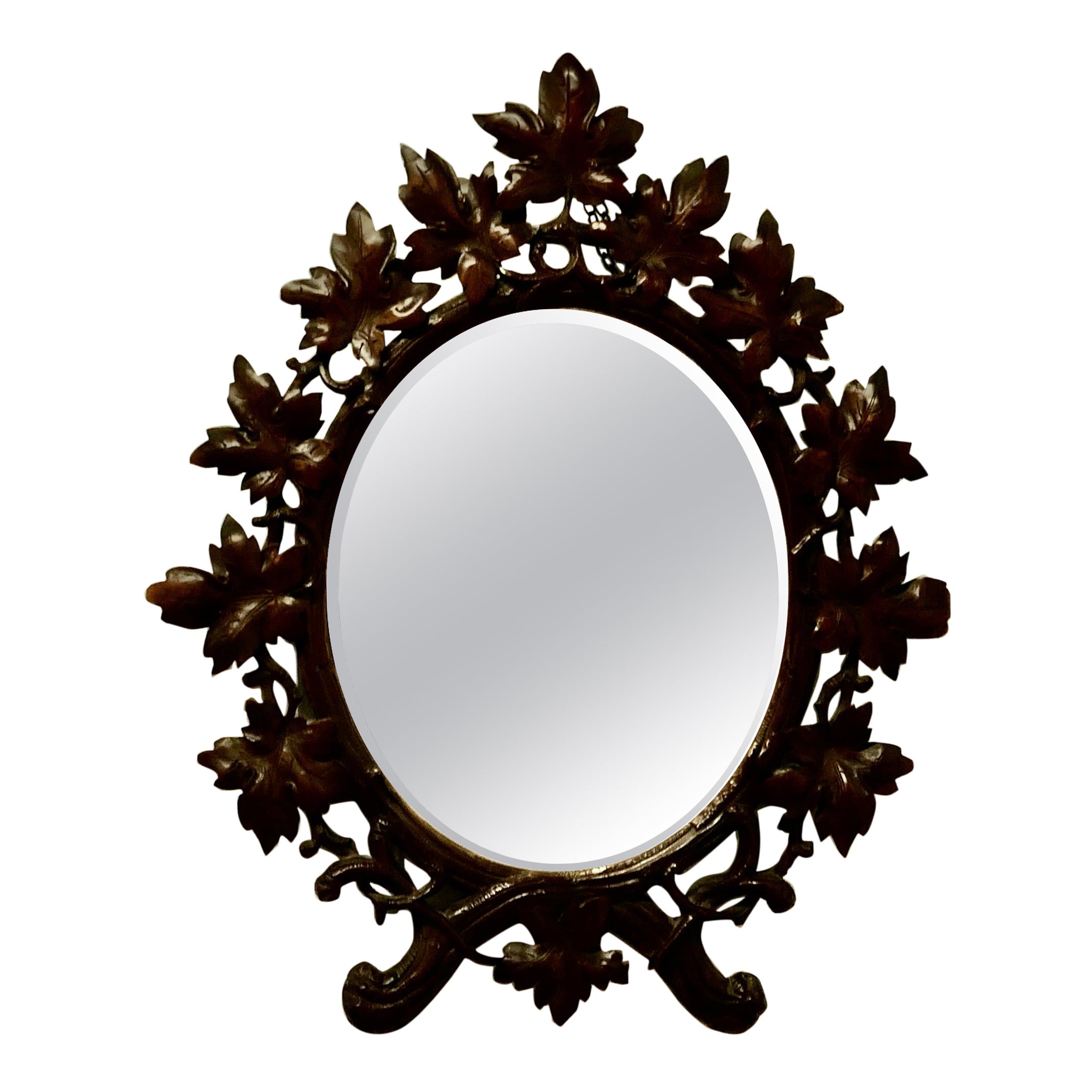 Miroir ovale sculpté Forêt-Noire