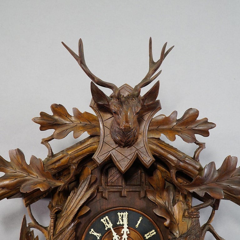 Black Forest Carved Wood Cuckoo and Quail Clock with Deer Head For Sale