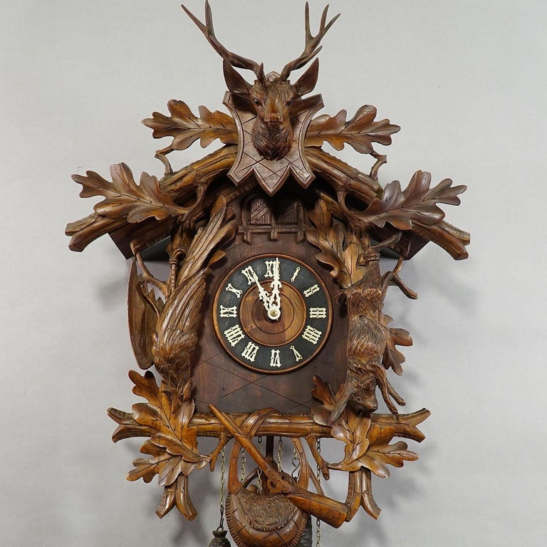 Black Forest Carved Wood Cuckoo and Quail Clock with Deer Head For Sale
