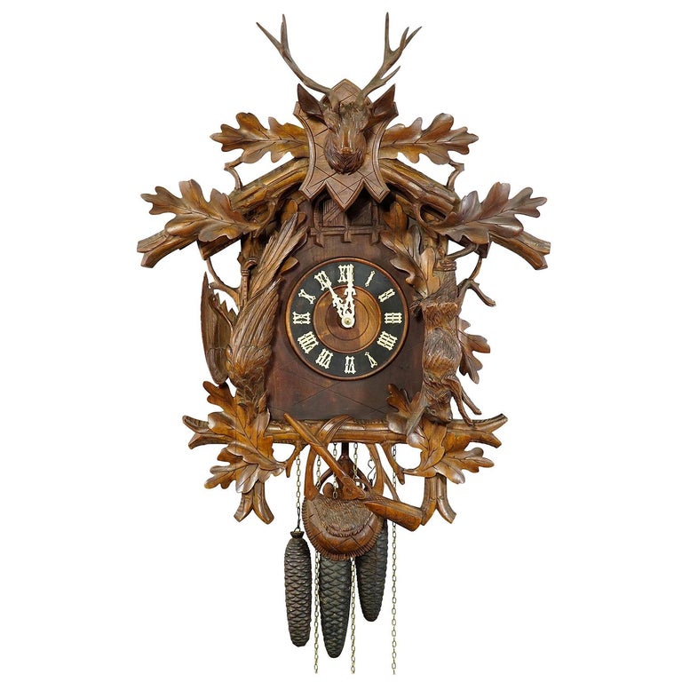 Black Forest Carved Wood Cuckoo and Quail Clock with Deer Head For Sale