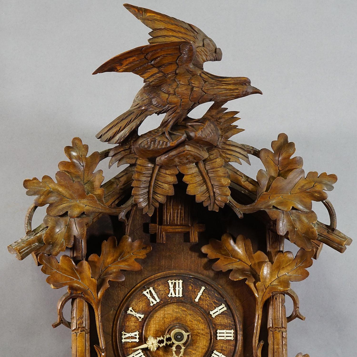 clock with bird on top