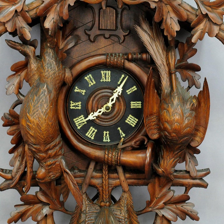Black Forest Carved Wood Cuckoo Clock with Large Eagle on Top For Sale