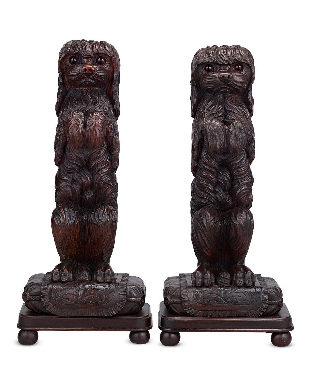 These remarkably detailed Black Forest carved door porters, each in the form of a begging spaniel standing on a cushion, cheerfully greet visitors. Exquisitely rendered, the delightful pooches display the outstanding artistry and creativity of the