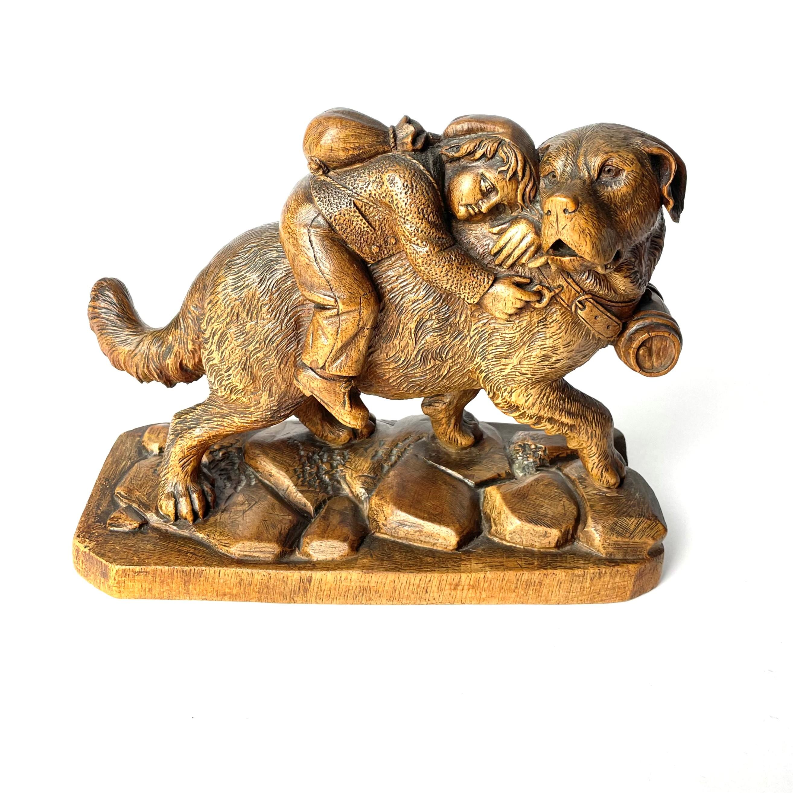 Beautiful and rare black Forest model carved in wood of a rescue dog helping a boy. 

The sculpture is generally in good condition with a beautiful patina, but has an old and well executed repair of the dog's tail. (Se pictures)

Made in