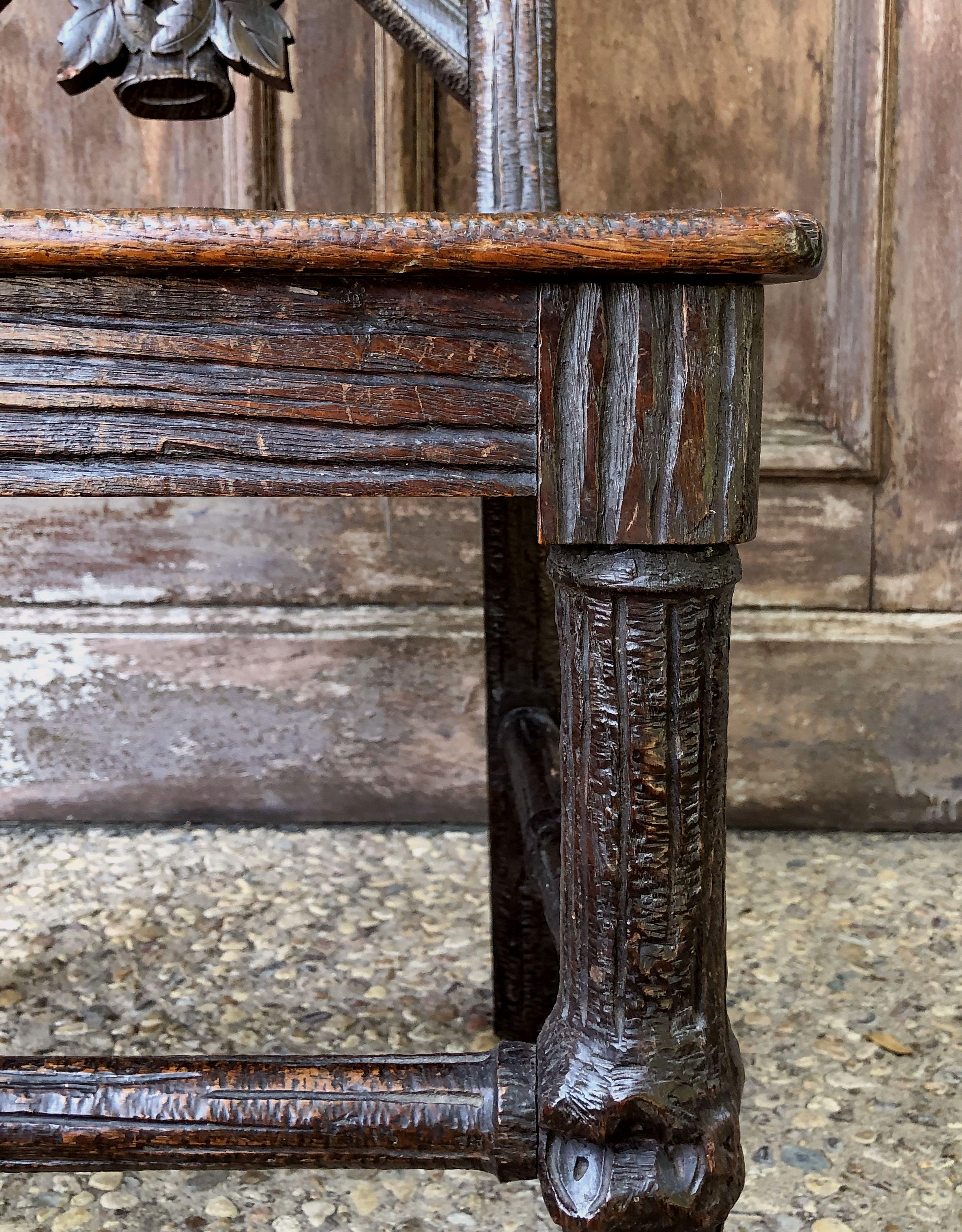 Black Forest Chair of Carved Oak from the 19th Century 10