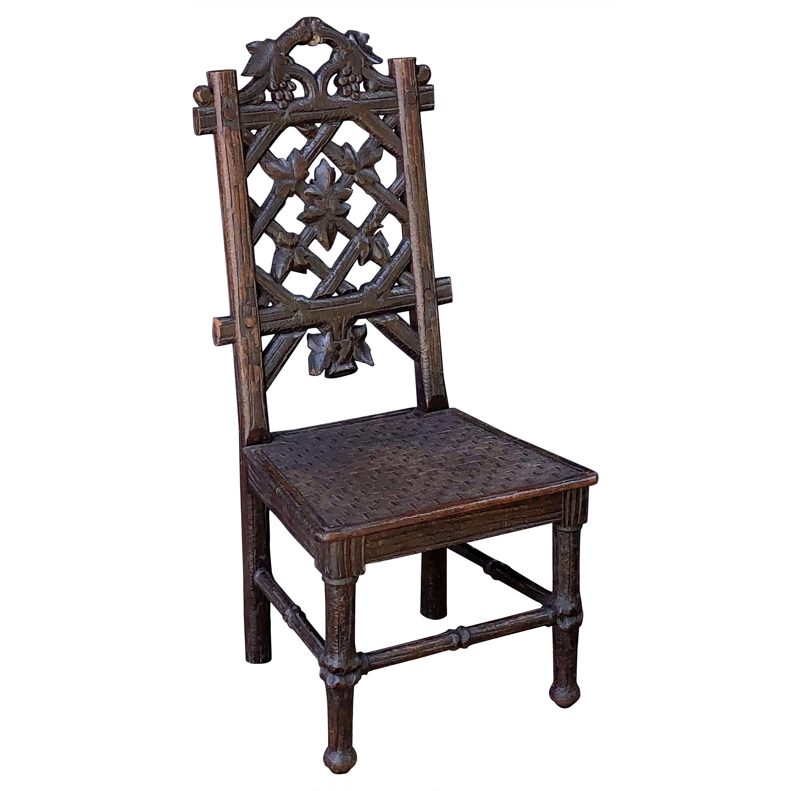 Black Forest Chair of Carved Oak from the 19th Century