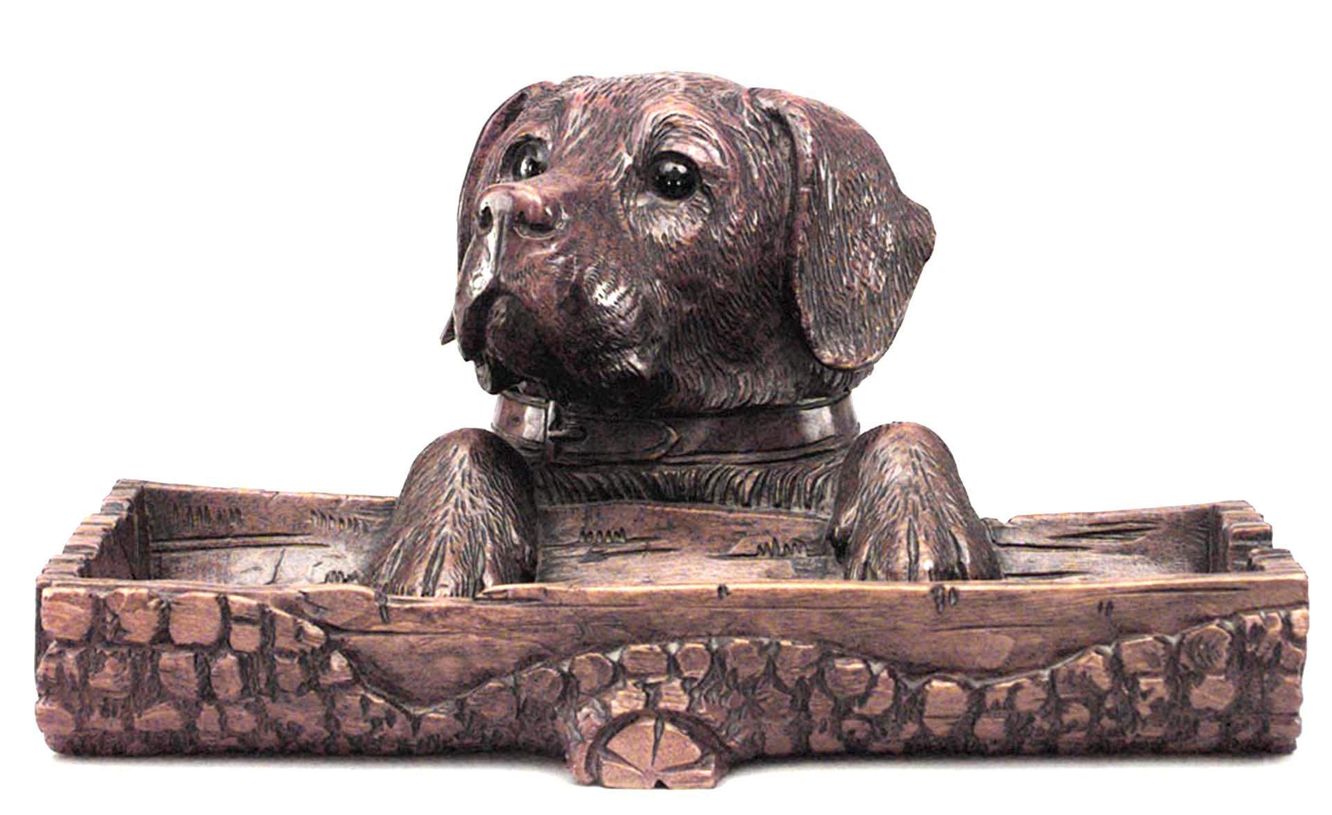 Rustic Black Forest (19/20th Century) walnut pen holder and inkwell with carved dog head leaning on log
