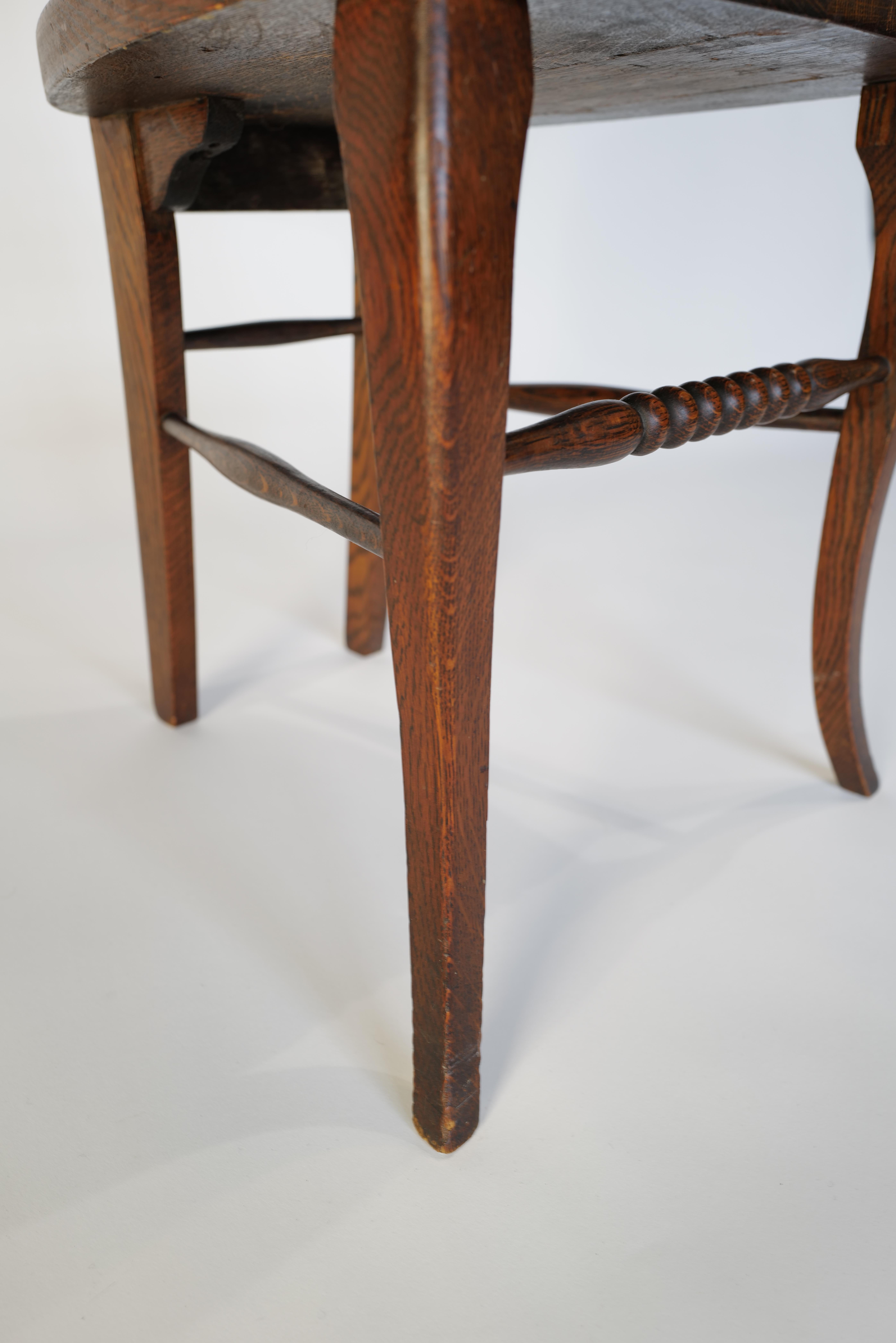 20th Century Black Forest Face North Wind Oak Chair