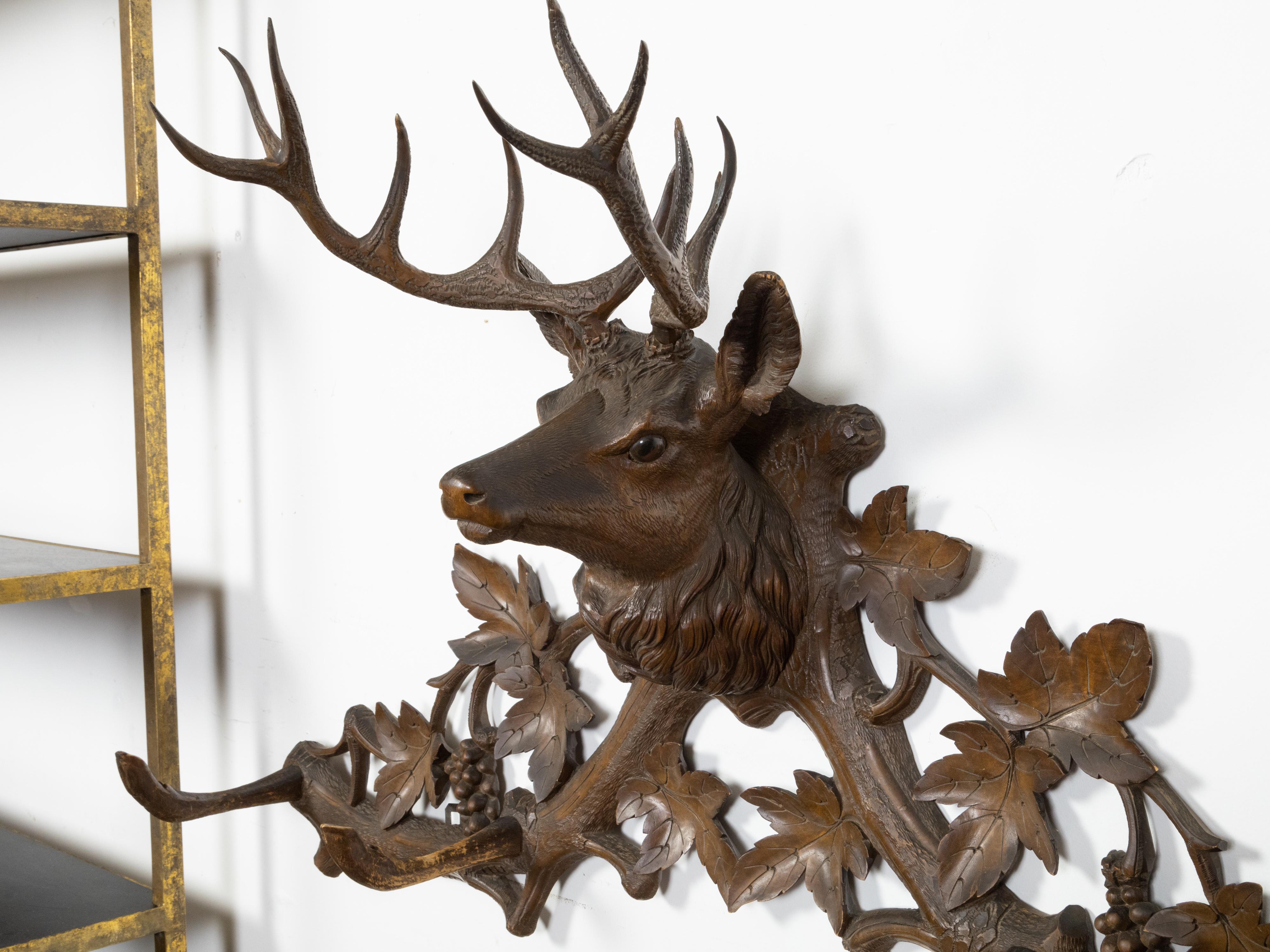 Black Forest Four-Hook Coat Hanger with Hand-Carved Stag Head and Grapevines In Good Condition In Atlanta, GA