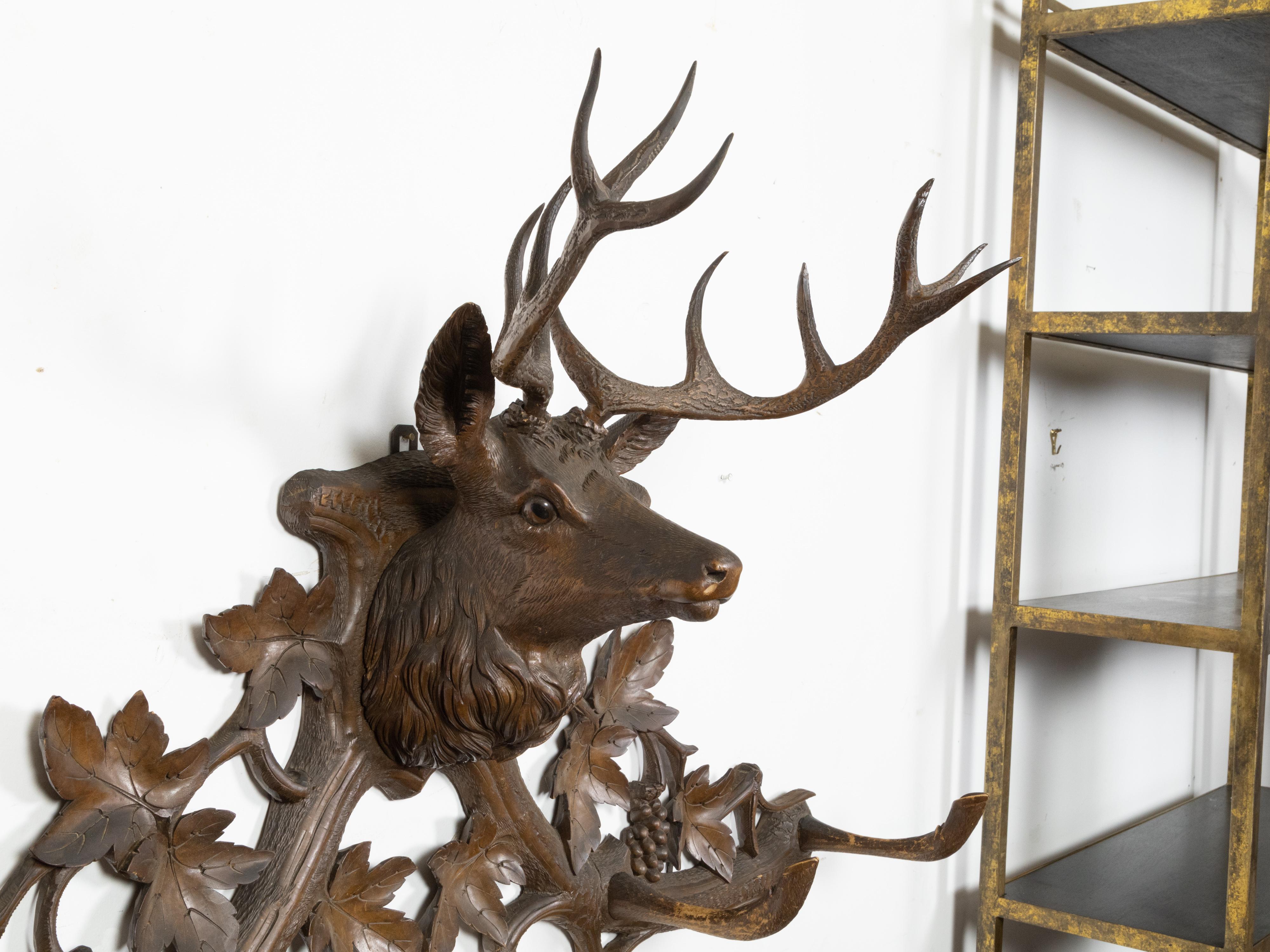 Glass Black Forest Four-Hook Coat Hanger with Hand-Carved Stag Head and Grapevines