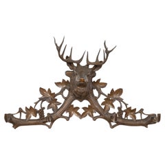 Antique Black Forest Four-Hook Coat Hanger with Hand-Carved Stag Head and Grapevines