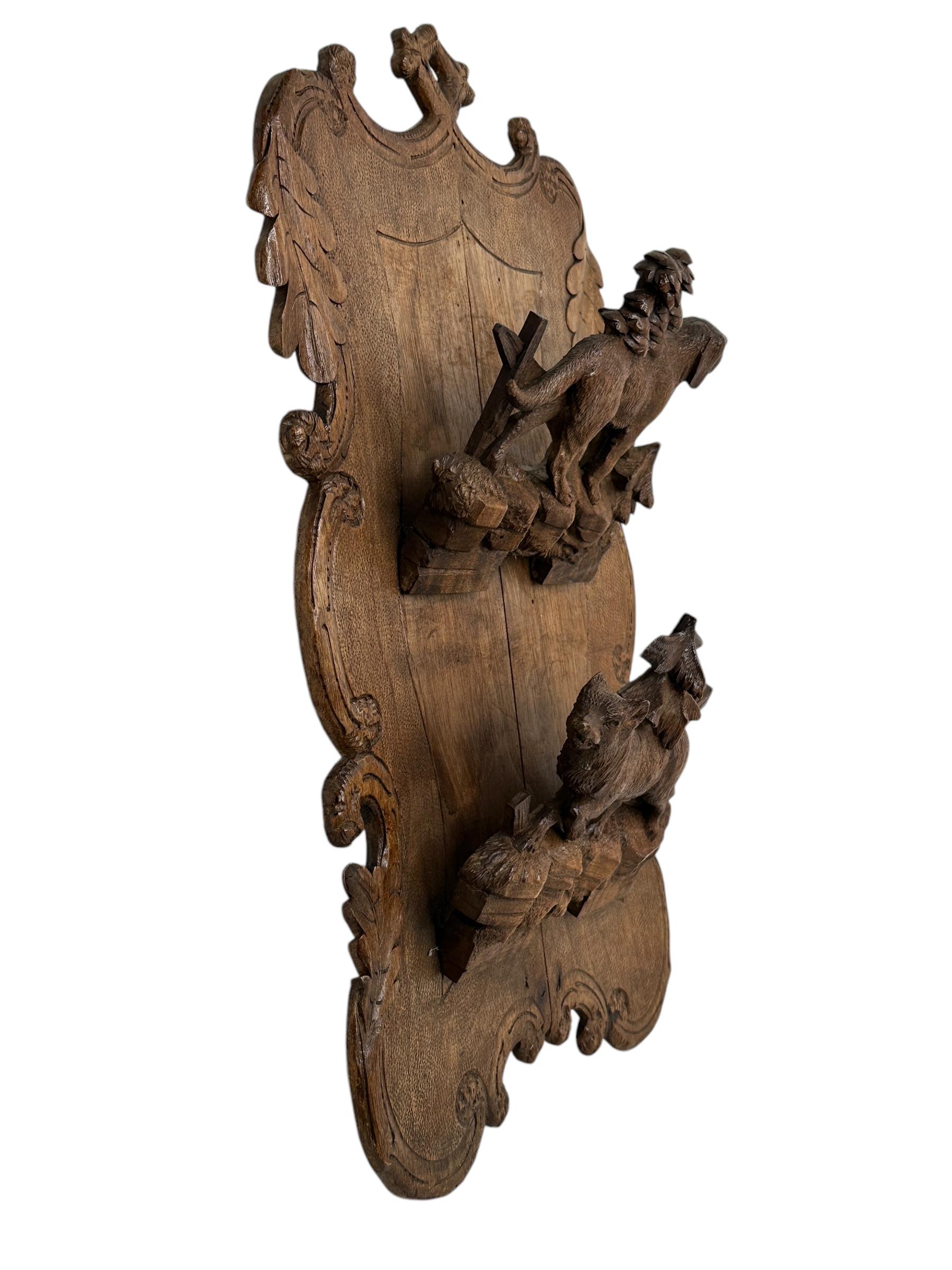 A lovely wall board made of hand carved wood, made in the black forest or brienz area in Europe. Found at an estate sale in Nuremberg, Germany. It is not marked. A nice addition to your collection. It is in very good as found condition. Metal with a