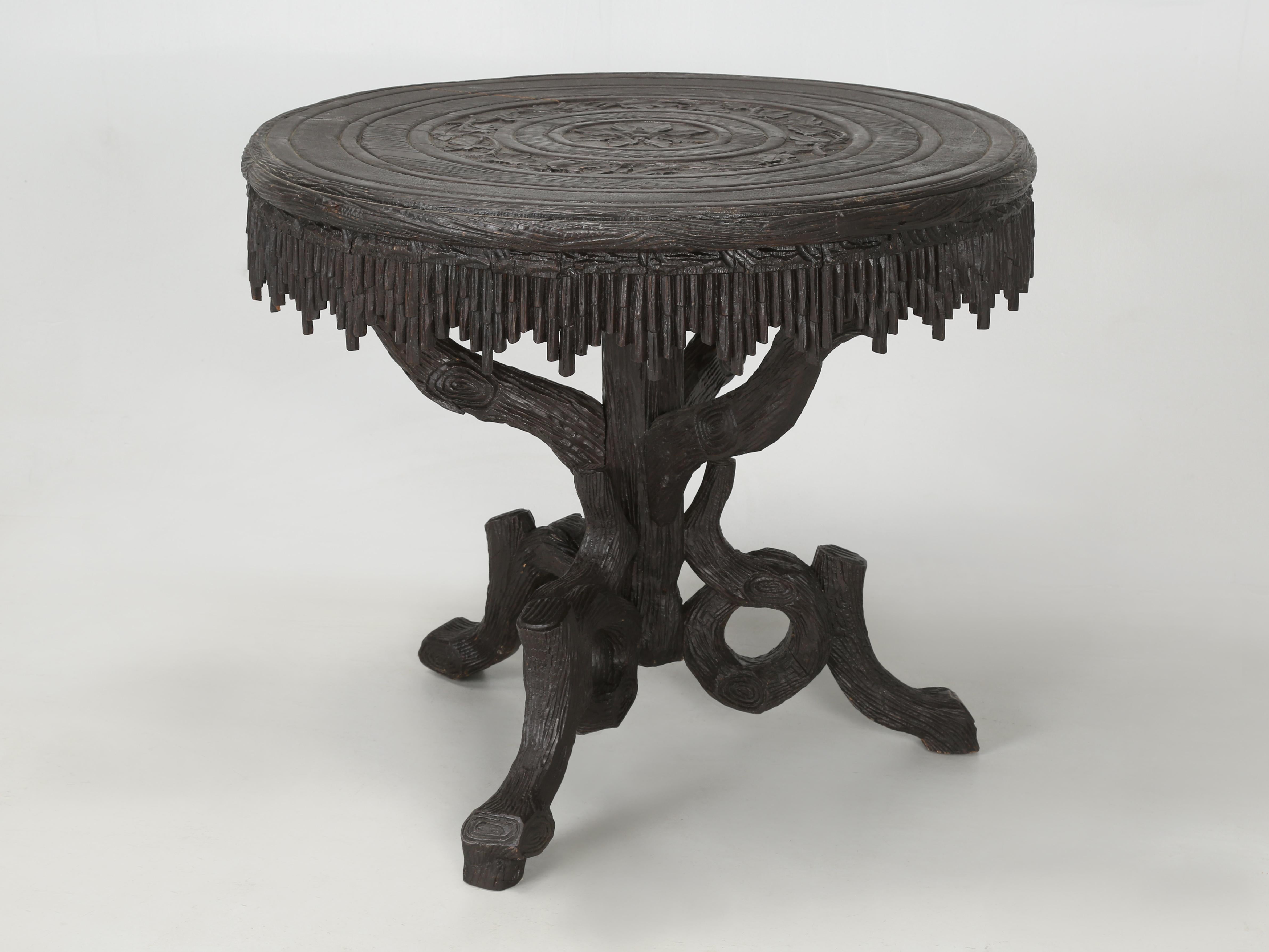 Another selection from our vast collection of Black Forest Furniture, is a beautiful small Dining Table or game table with a set of matching Black Forest Chairs. Black Forest Furniture is both, a bit rustic blended with a good dose of whimsy. Our