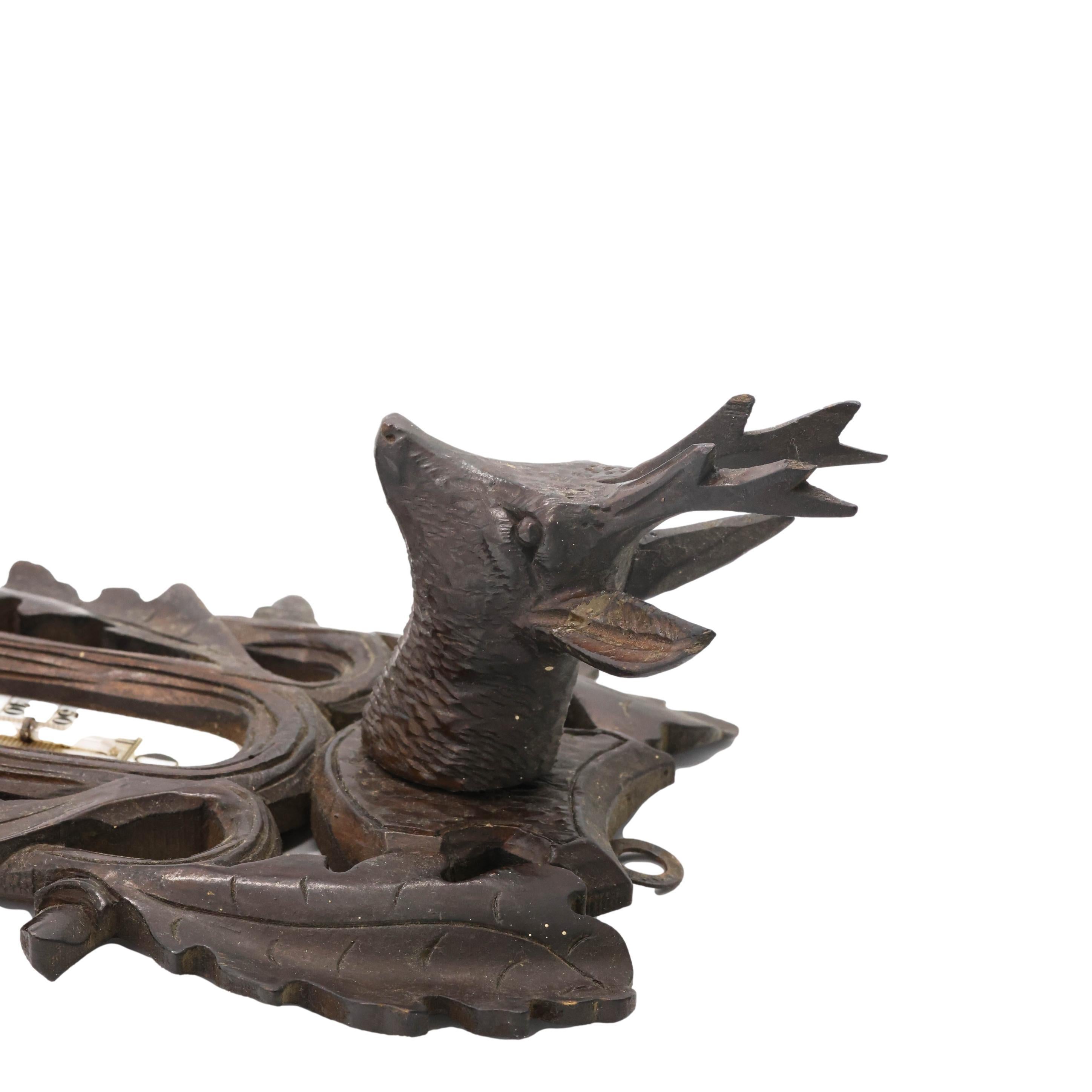 Swiss Black Forest Hand-Carved Barometer with Deer Head, Guns, and Game Bag, ca. 1890