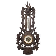 Black Forest Hand-Carved Barometer with Deer Head, Guns, and Game Bag, ca. 1890